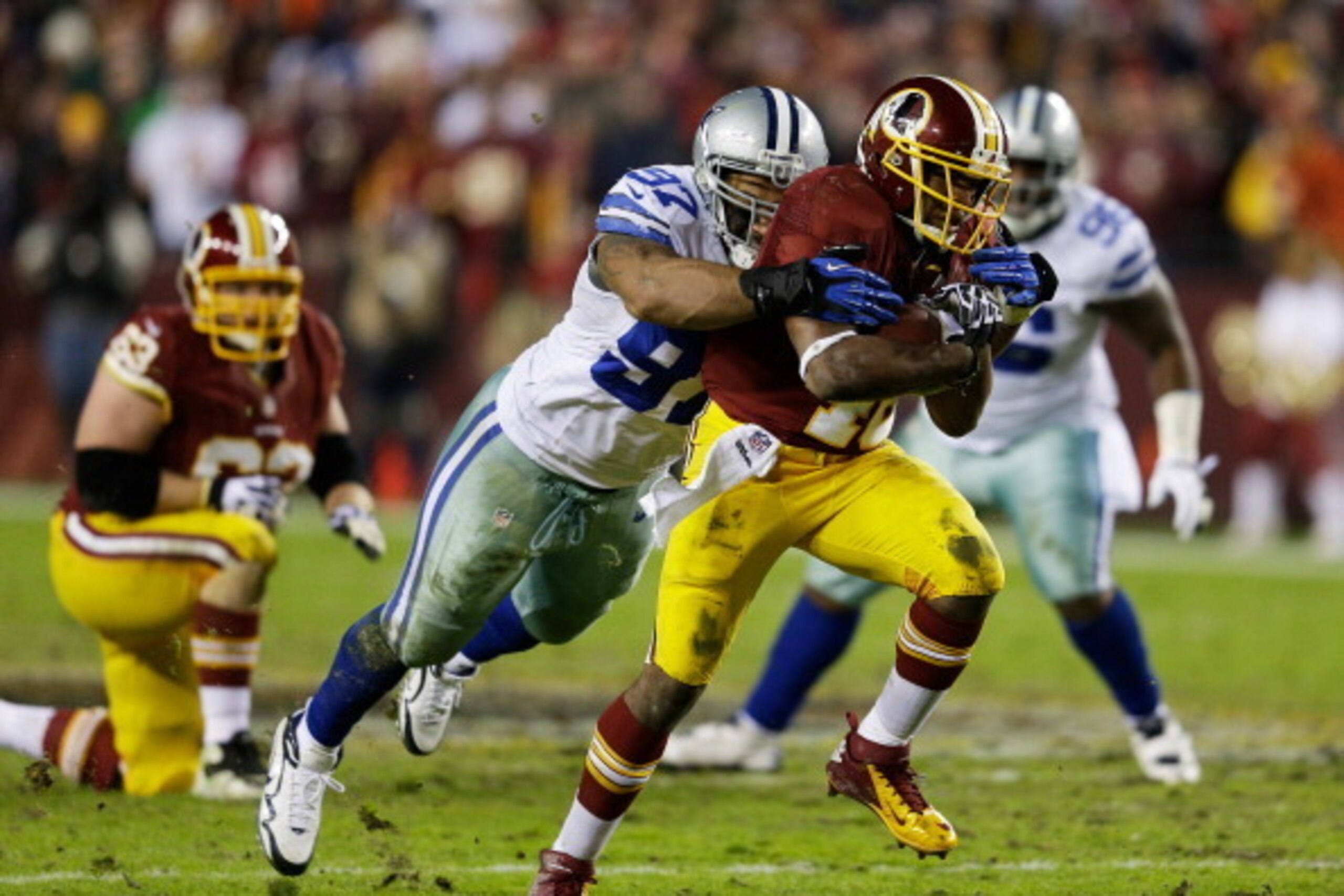 LANDOVER, MD - DECEMBER 30: Alfred Morris #46 of the Washington Redskins is tackled by Jason Hatcher #97 of the Dallas Cowboys in the second quarter of their game at FedExField on December 30, 2012 in Landover, Maryland. (Photo by Rob Carr/Getty Images LANDOVER, MD - DECEMBER 30: Alfred Morris #46 of the Washington Redskins is tackled by Jason Hatcher #97 of the Dallas Cowboys in the second quarter of their game at FedExField on December 30, 2012 in Landover, Maryland. (Photo by Rob Carr/Getty Images