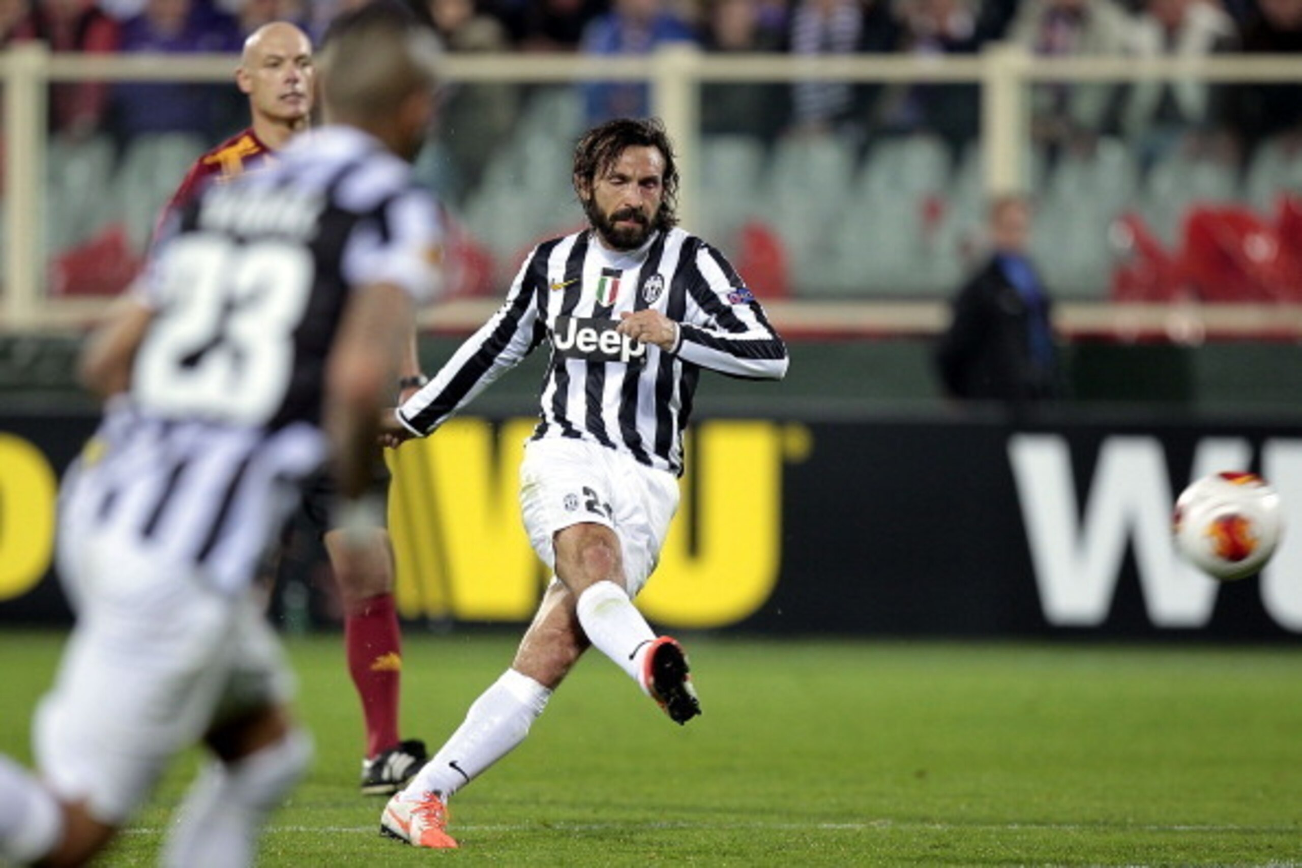 FLORENCE, ITALY - MARCH 20: Andrea Pirlo of Juventus FC scores the opening goal during the UEFA Europa League Round of 16 second leg match between ACF Fiorentina and Juventus at Stadio Artemio Franchi on March 20, 2014 in Florence, Italy.  (Photo by Gabri