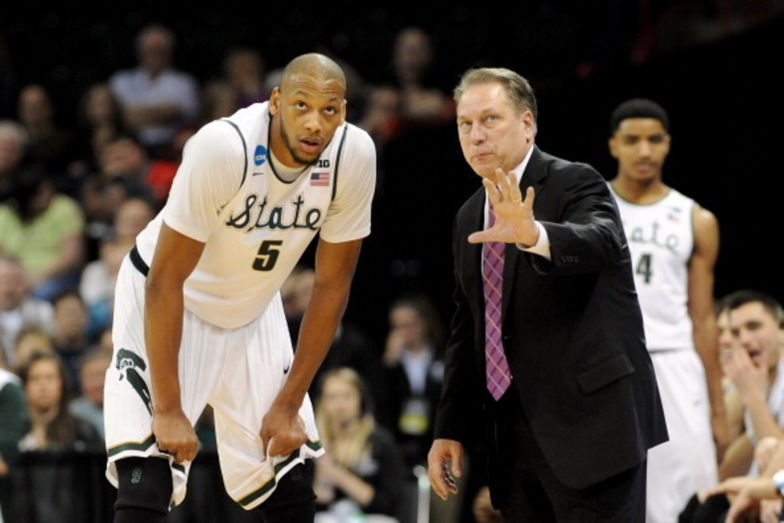 SPOKANE, WA - MARCH 20:  Michigan State Spartans head coach Tom Izzo  talks to Adreian Payne #5 during their game against the Delaware Fightin Blue Hens in the second round of the 2014 NCAA Men's Basketball Tournament at Spokane Veterans Memorial Arena on