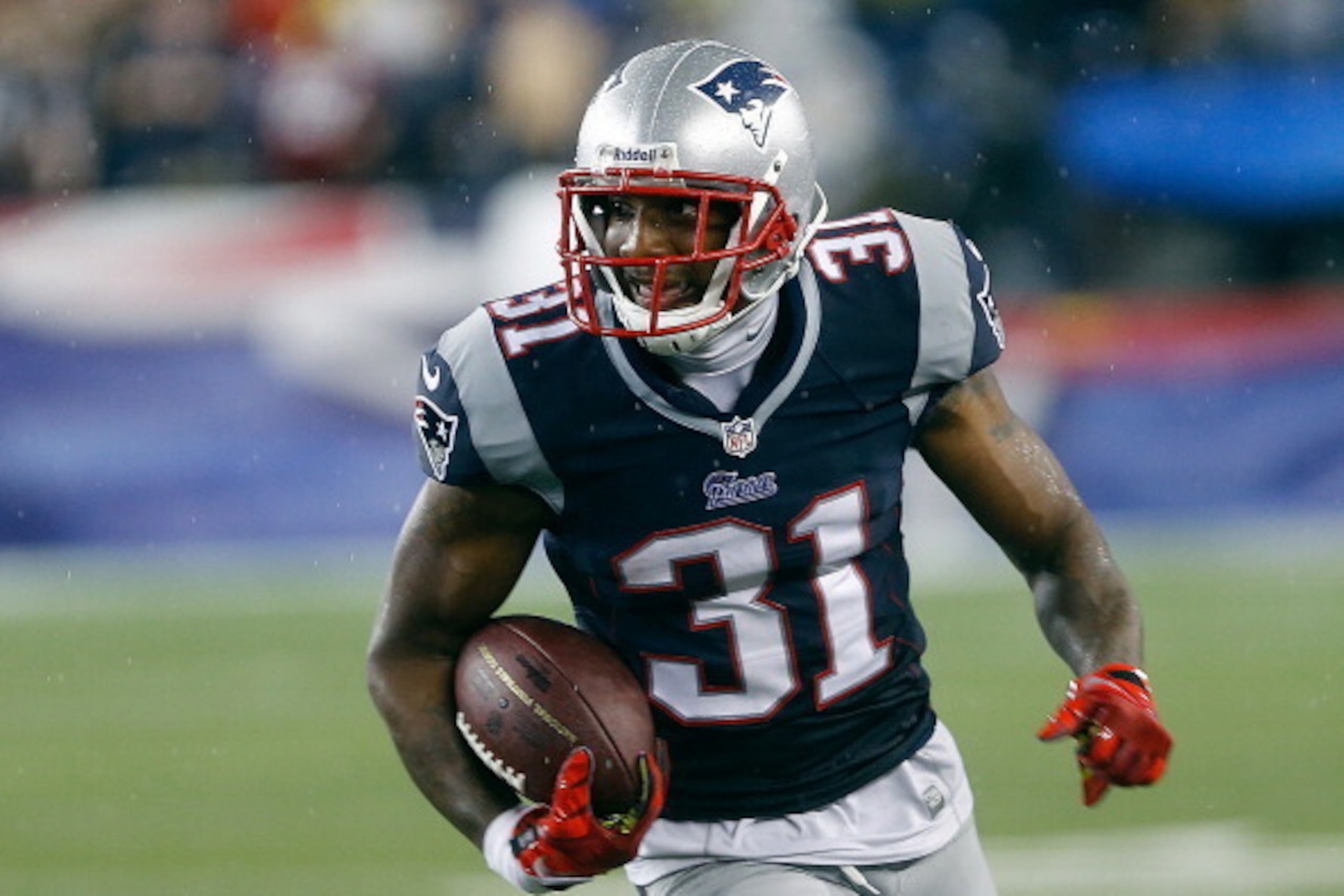FOXBORO, MA - SEPTEMBER 12: Aqib Talib #31 of the New England Patriots runs the ball after he intercepted a pass intended for a New York Jets receiver in the 4th quarter at Gillette Stadium on September 12, 2013 in Foxboro, Massachusetts. (Photo by Jim Ro