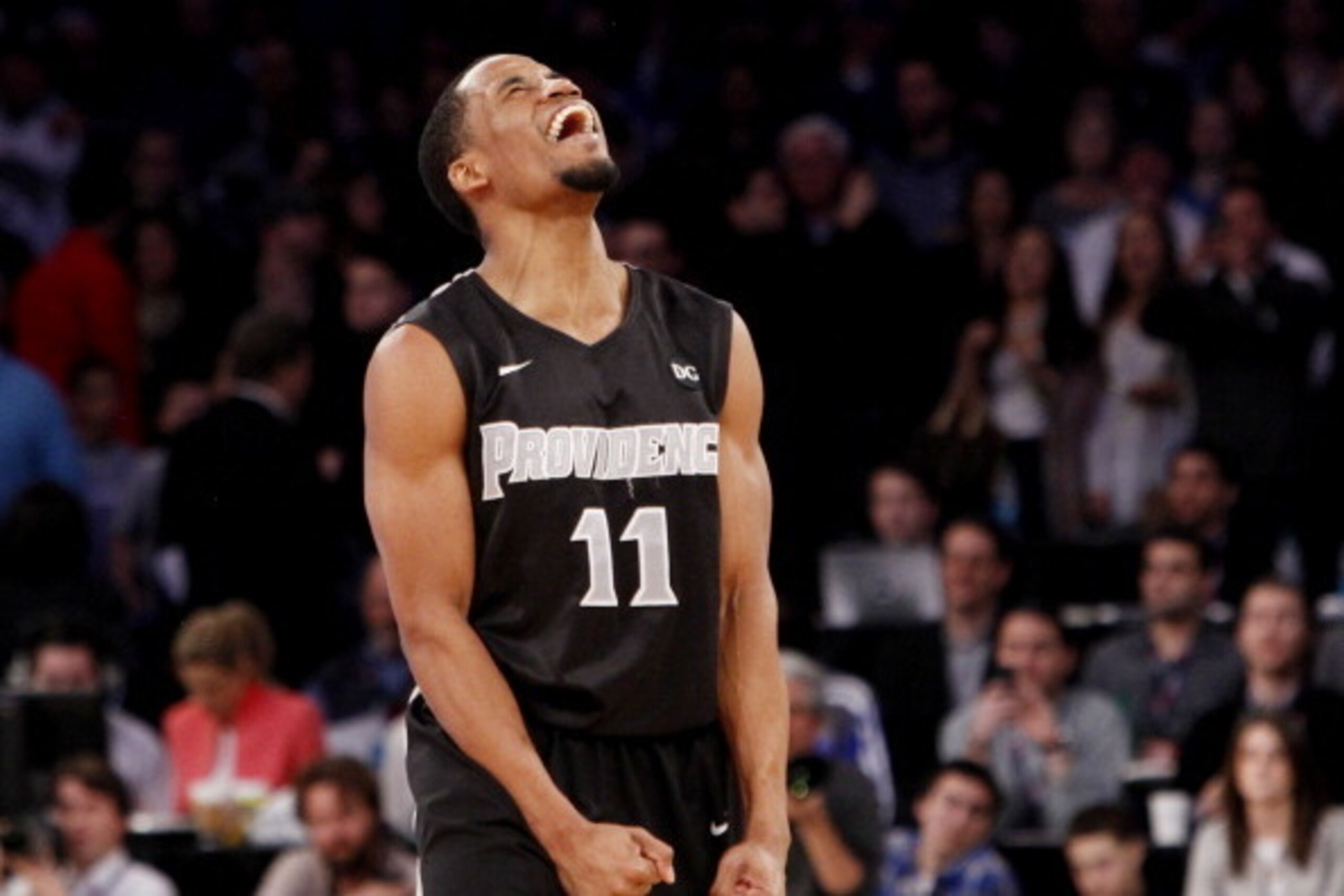 NEW YORK, NY - MARCH 15:  Bryce Cotton #11 of the Providence Friars celebrates in the final seconds of their 65 to 58 win over the Creighton Bluejays during the Championship game of the 2014 Men's Big East Basketball Tournament at Madison Square Garden on