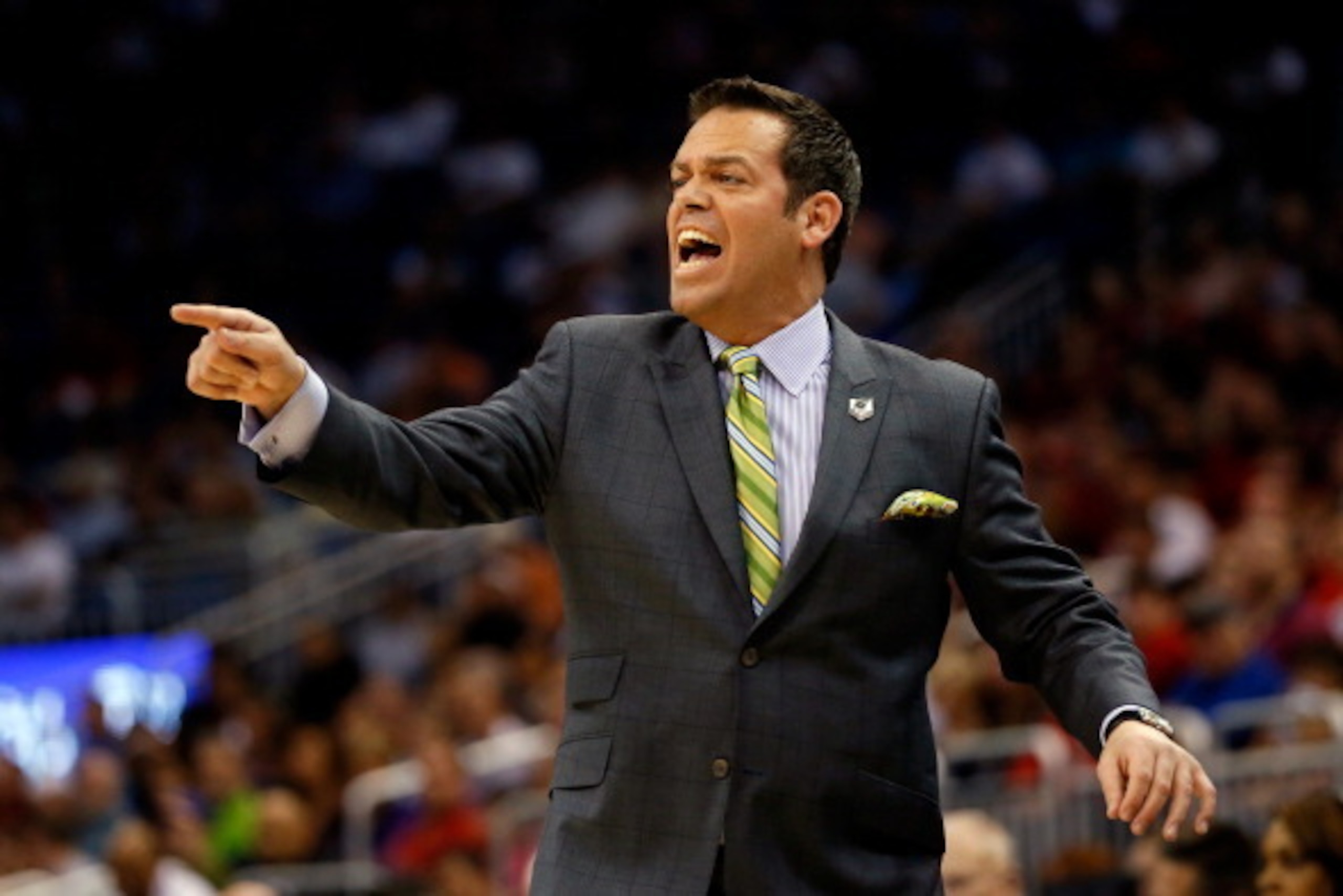 ORLANDO, FL - MARCH 20:  Head coach Steve Masiello of the Manhattan Jaspers shouts to his players against the Louisville Cardinals during the second round of the 2014 NCAA Men's Basketball Tournament at Amway Center on March 20, 2014 in Orlando, Florida. 