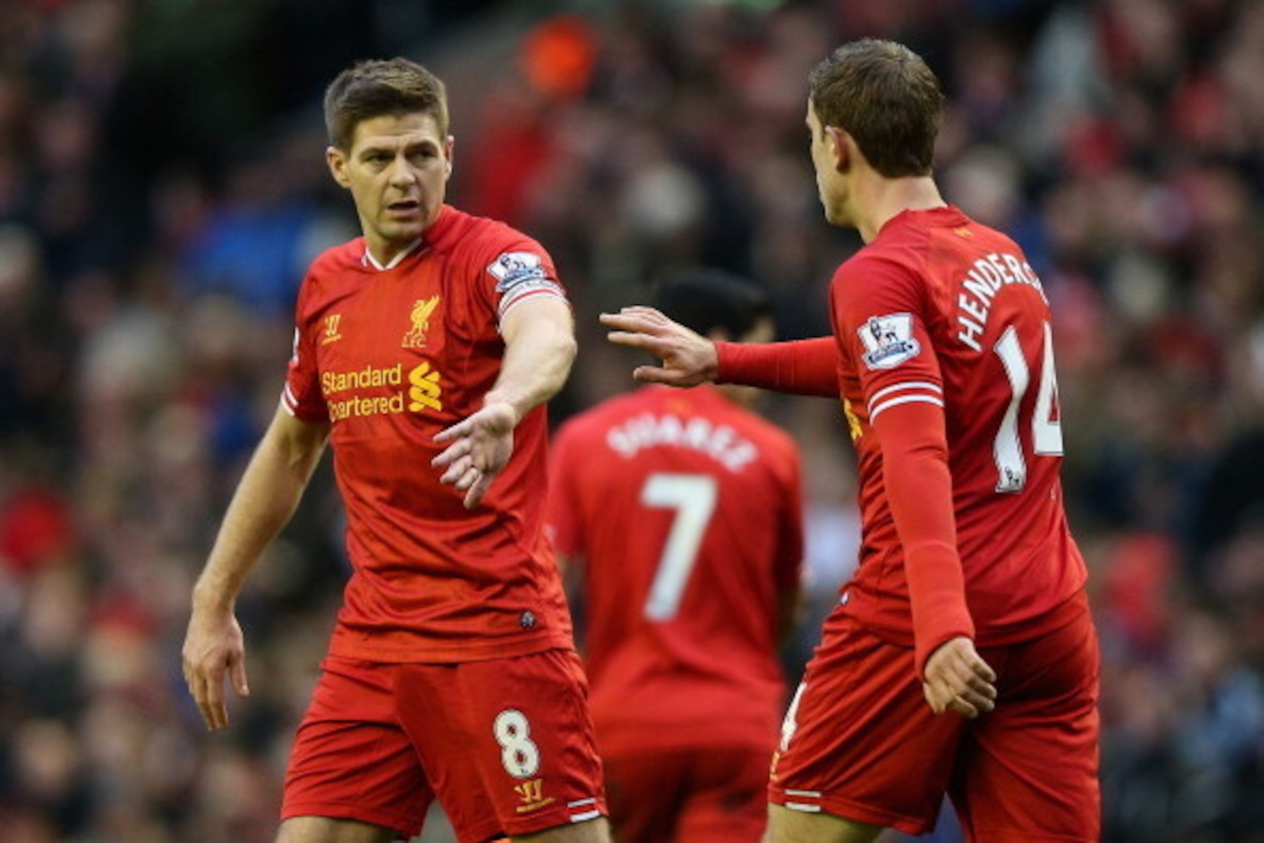 LIVERPOOL, ENGLAND - FEBRUARY 23: Jordan Henderson of Liverpool celebrates scoring his team's fourth goal with his team-mate Steven Gerrard during the Barclays Premier League match between Liverpool and Swansea City at Anfield on February 23, 2014 in Liv LIVERPOOL, ENGLAND - FEBRUARY 23: Jordan Henderson of Liverpool celebrates scoring his team's fourth goal with his team-mate Steven Gerrard during the Barclays Premier League match between Liverpool and Swansea City at Anfield on February 23, 2014 in Liv