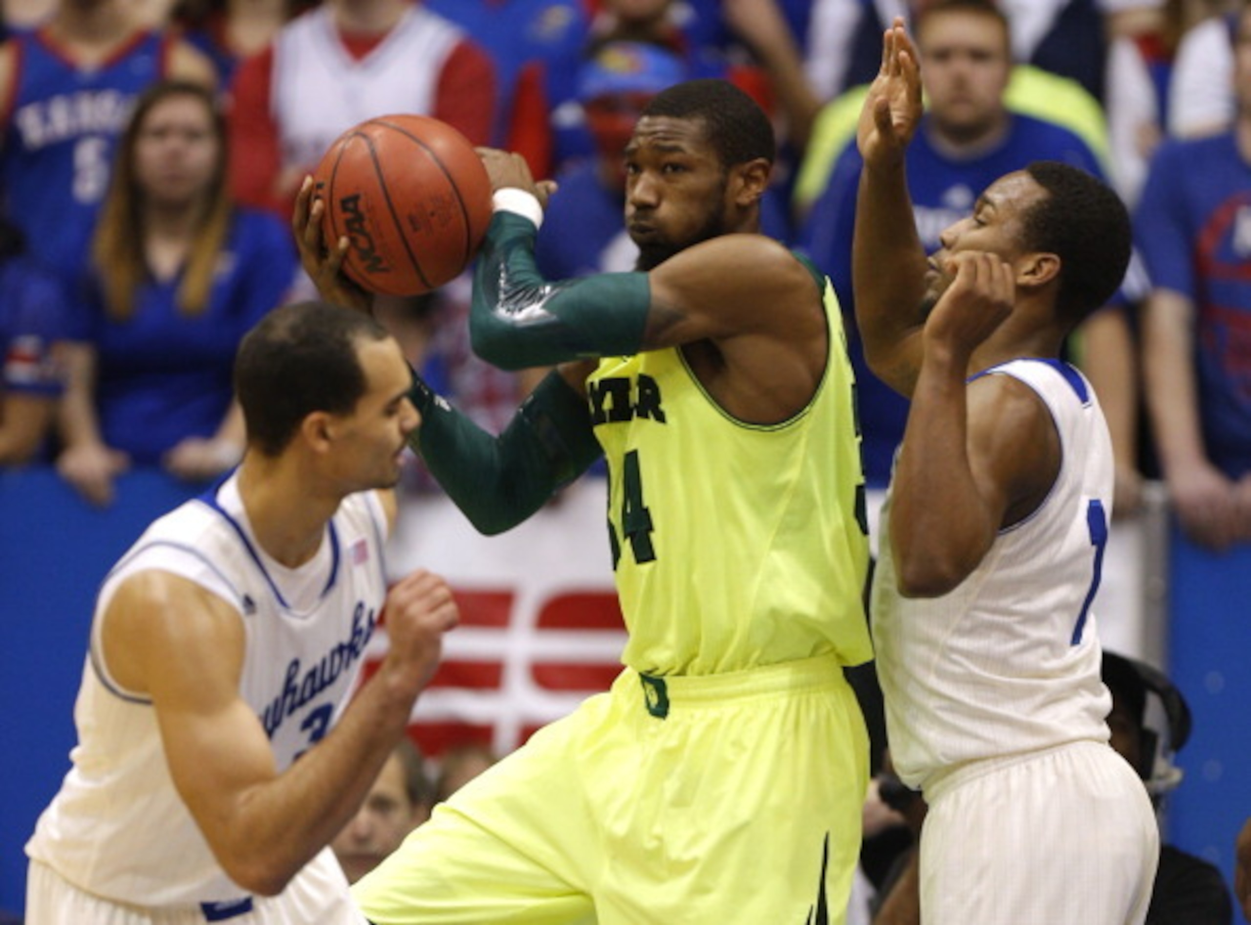 LAWRENCE, KS - JANUARY 20:  Cory Jefferson #34 of the Baylor Bears grabs a rebound from Wayne Selden, Jr. #1 of the Kansas Jayhawks in the second half at Allen Fieldhouse on January  20, 2014 in Lawrence, Kansas. (Photo by Ed Zurga/Getty Images)