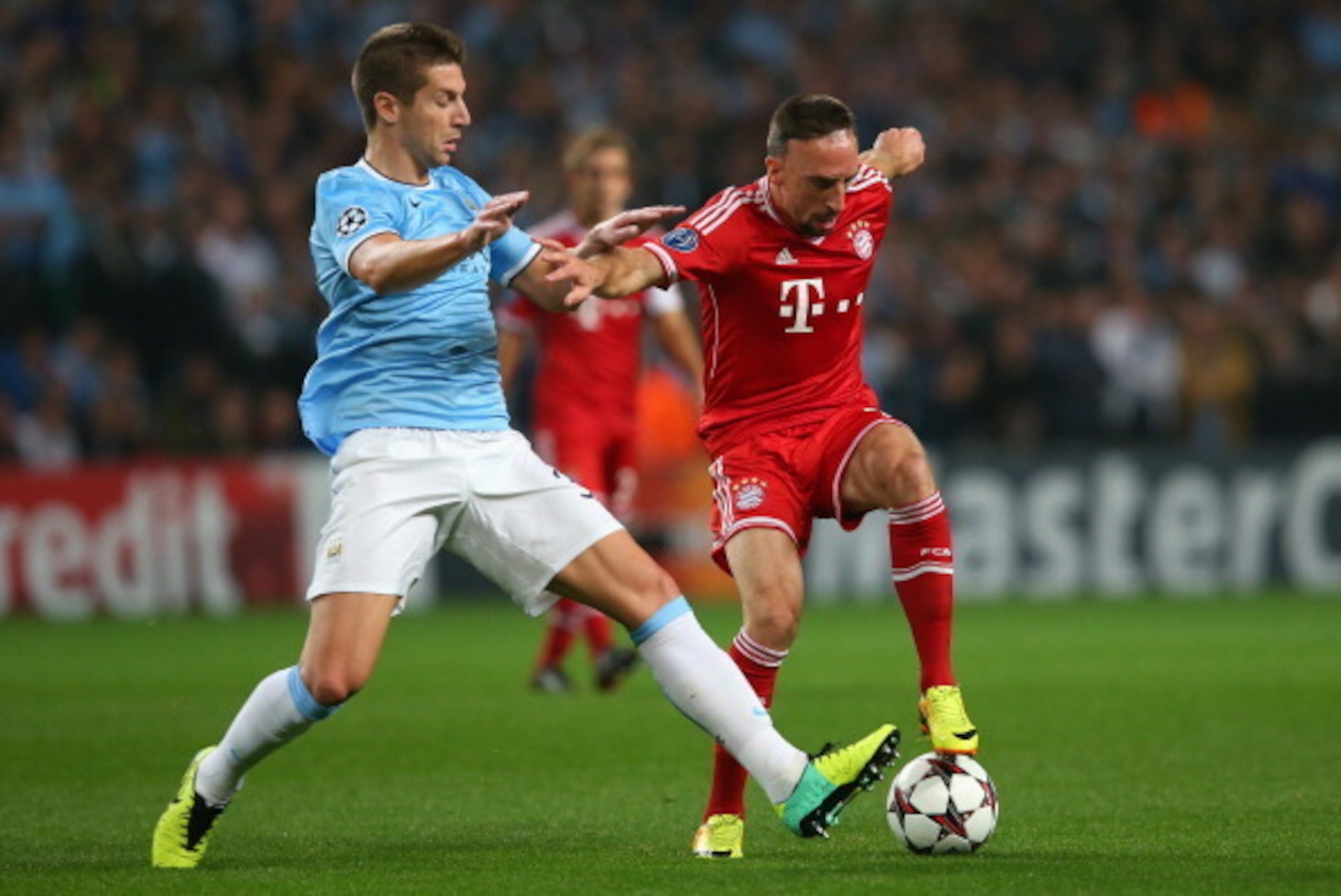 MANCHESTER, ENGLAND - OCTOBER 02:  Franck Ribery of Muenchen battles with Matija Nastasic of Manchester City during the UEFA Champions League Group D match between Manchester City and FC Bayern Muenchen at Etihad Stadium on October 2, 2013 in Manchester,