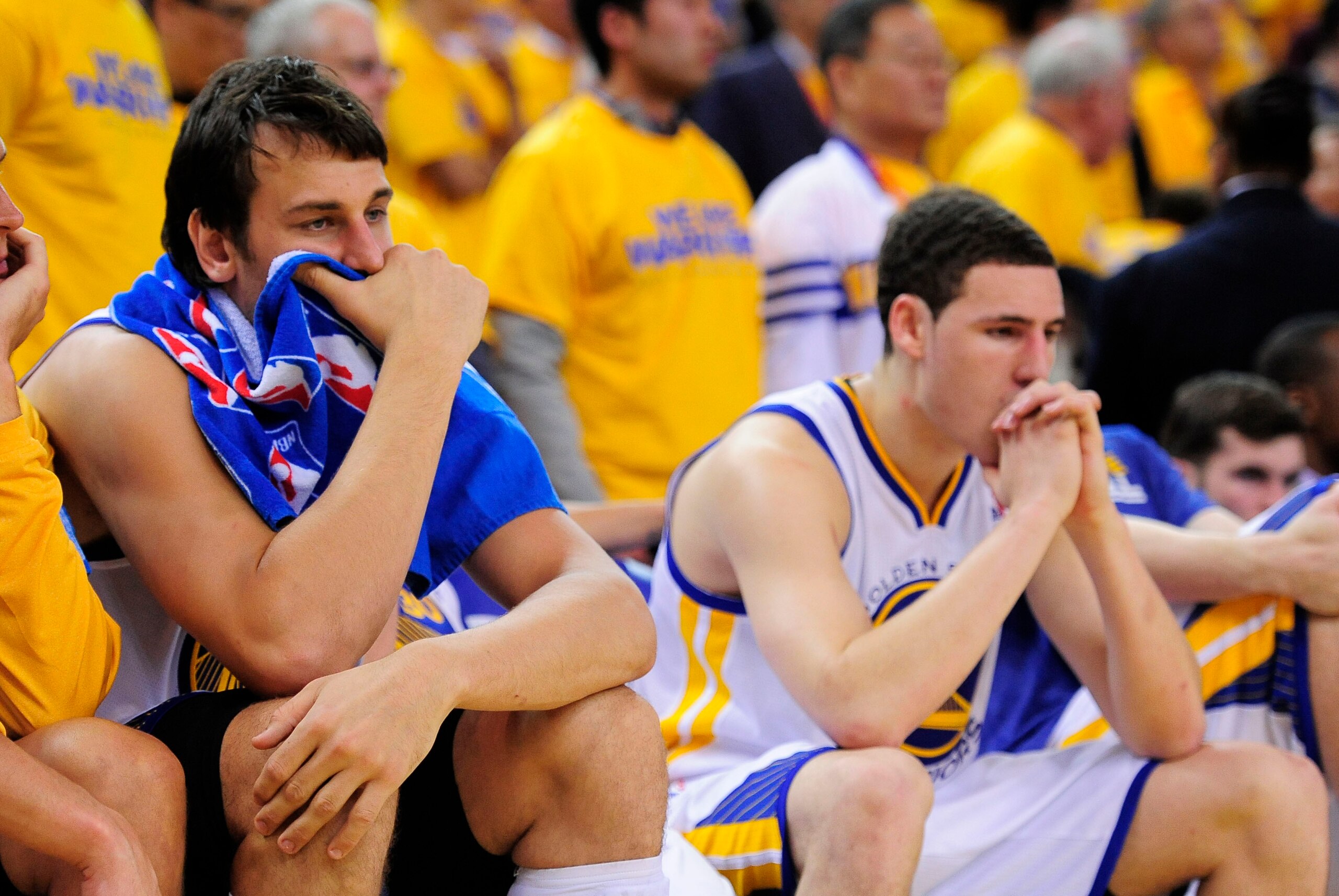 May 16, 2013; Oakland, CA, USA; Golden State Warriors center Andrew Bogut (12, left) and shooting guard Klay Thompson (11, right) react against the San Antonio Spurs during the fourth quarter in game six of the second round of the 2013 NBA Playoffs at Ora