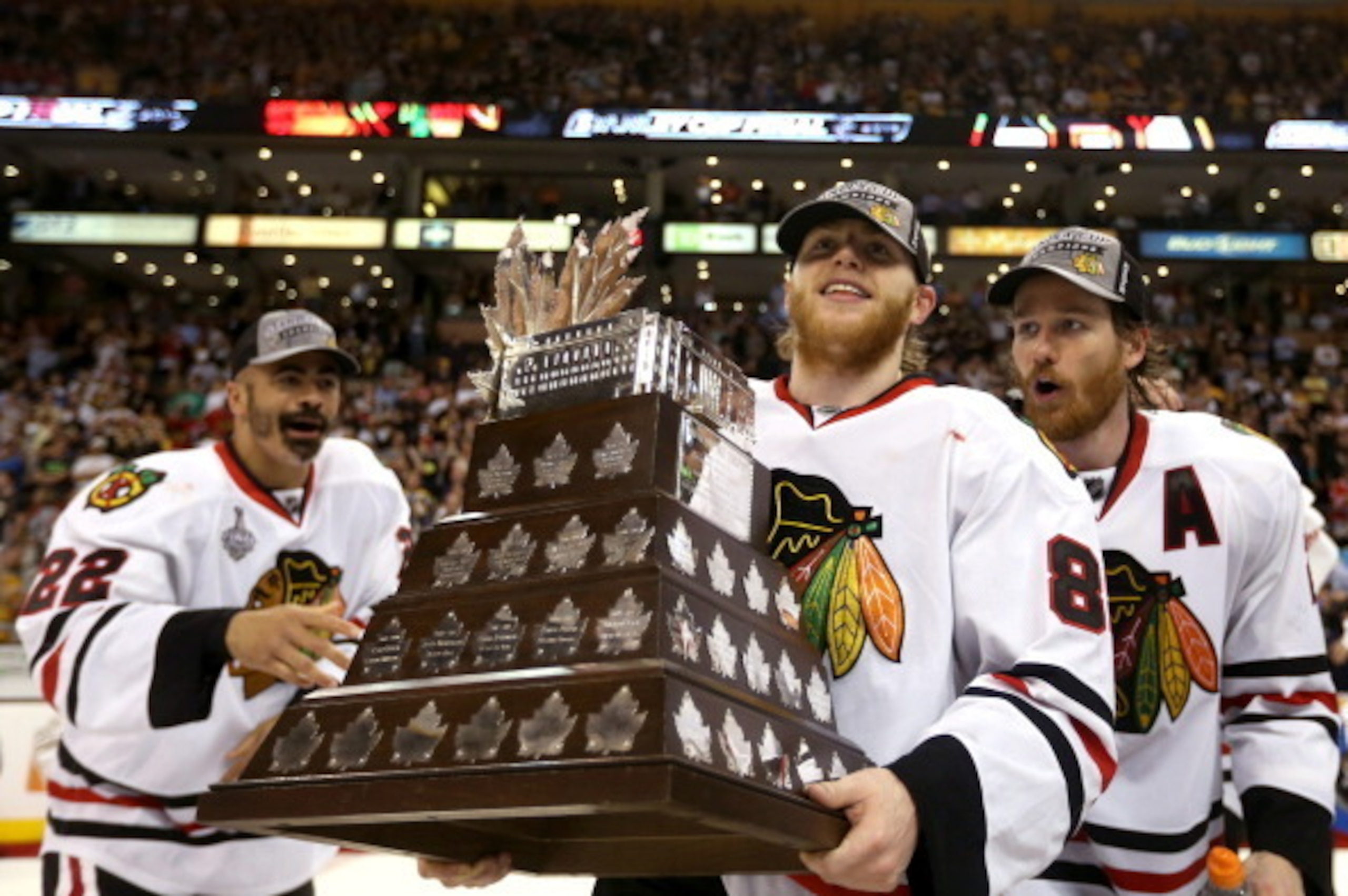 BOSTON, MA - JUNE 24:  Patrick Kane #88 of the Chicago Blackhawks skate after Kane won the Conn Smythe Trophy after defeating the Boston Bruins in Game Six of the 2013 NHL Stanley Cup Final at TD Garden on June 24, 2013 in Boston, Massachusetts.  (Photo b