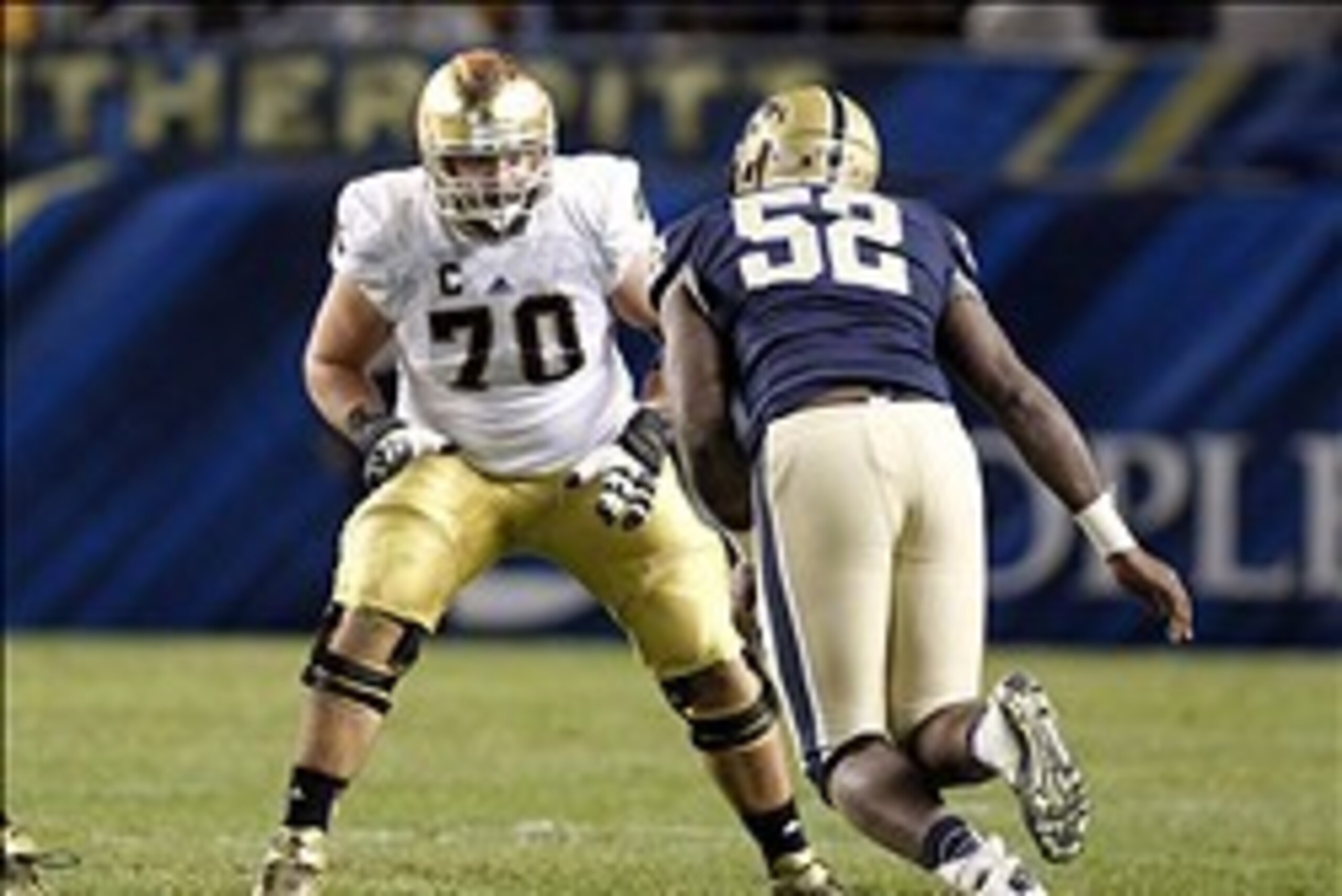 Nov 9, 2013; Pittsburgh, PA, USA; Notre Dame Fighting Irish offensive tackle Zack Martin (70) blocks at the line of scrimmage against Pittsburgh Panthers defensive lineman Shakir Soto (52) during the fourth quarter at Heinz Field. Pittsburgh won 28-21. Ma