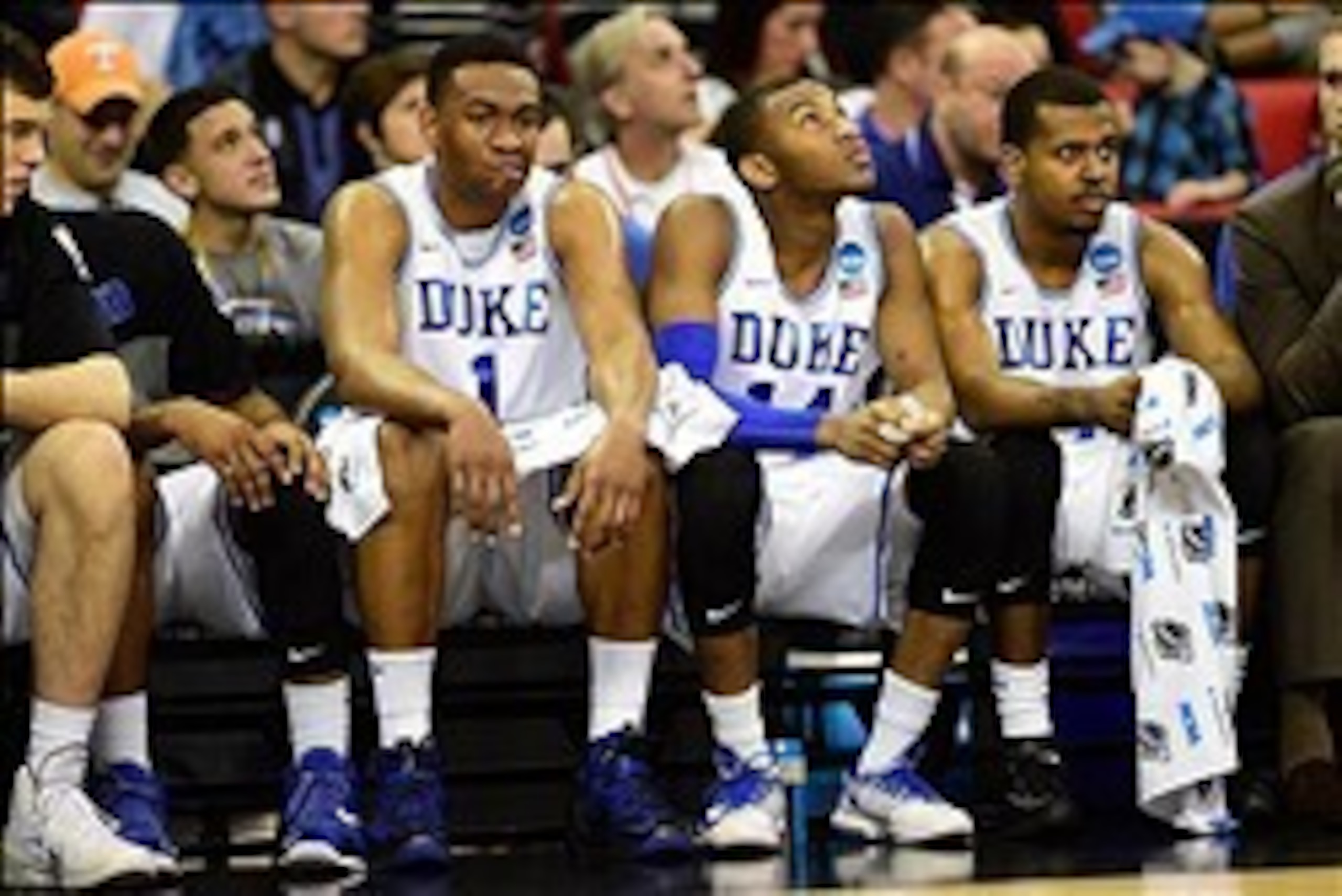Mar 21, 2014; Raleigh, NC, USA; Duke Blue Devils forward Jabari Parker (1), guard Rasheed Sulaimon (14) and Duke Blue Devils forward Josh Hairston (15) react on the bench against the Mercer Bears in the first half of a men's college basketball game during