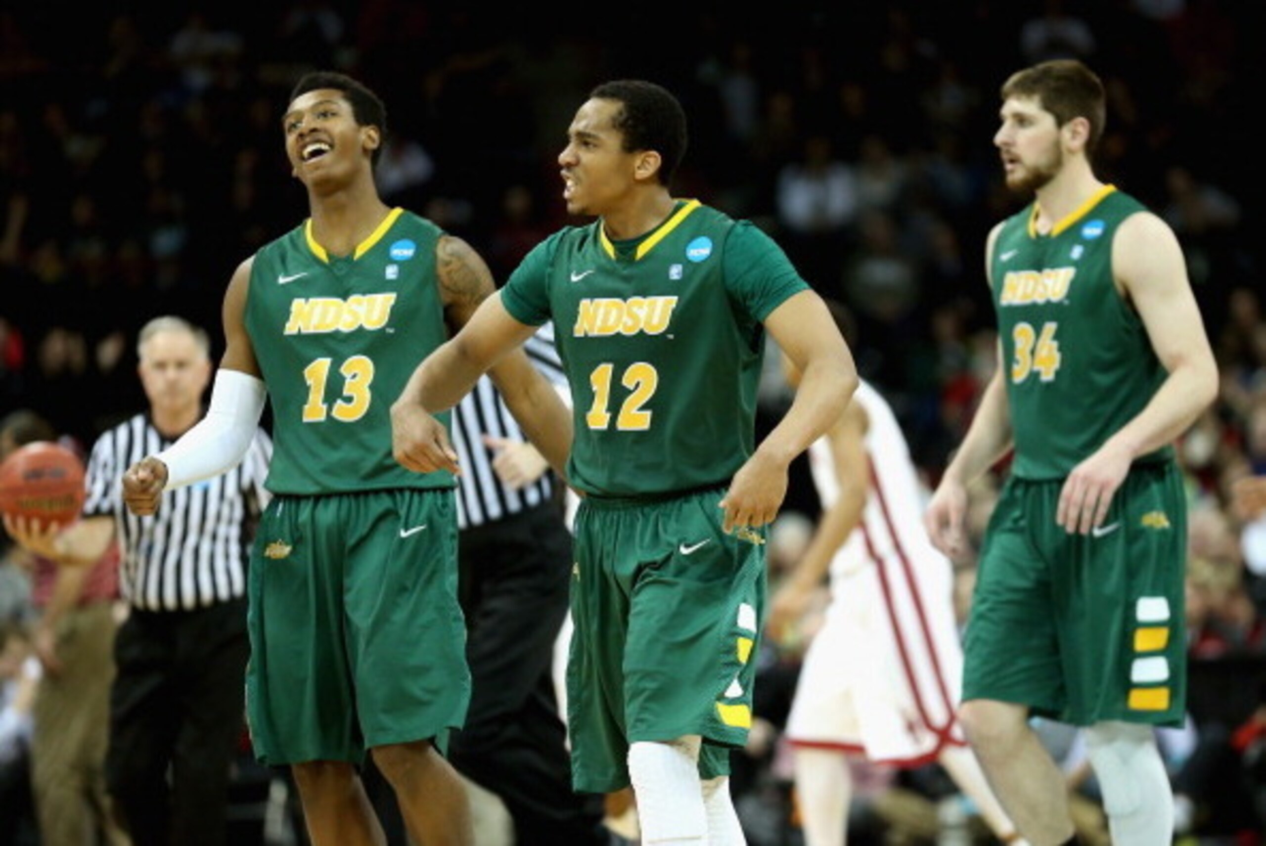 SPOKANE, WA - MARCH 20:  Lawrence Alexander #12 of the North Dakota State Bison celebrates against the Oklahoma Sooners during the second round of the 2014 NCAA Men's Basketball Tournament at Spokane Veterans Memorial Arena on March 20, 2014 in Spokane, W