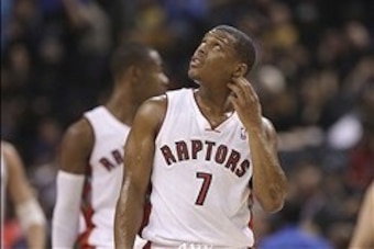 Mar 16, 2014; Toronto, Ontario, CAN; Toronto Raptors point guard Kyle Lowry (7) looks on against the Phoenix Suns at Air Canada Centre. The Suns beat the Raptors 121-113. Mandatory Credit: Tom Szczerbowski-USA TODAY Sports