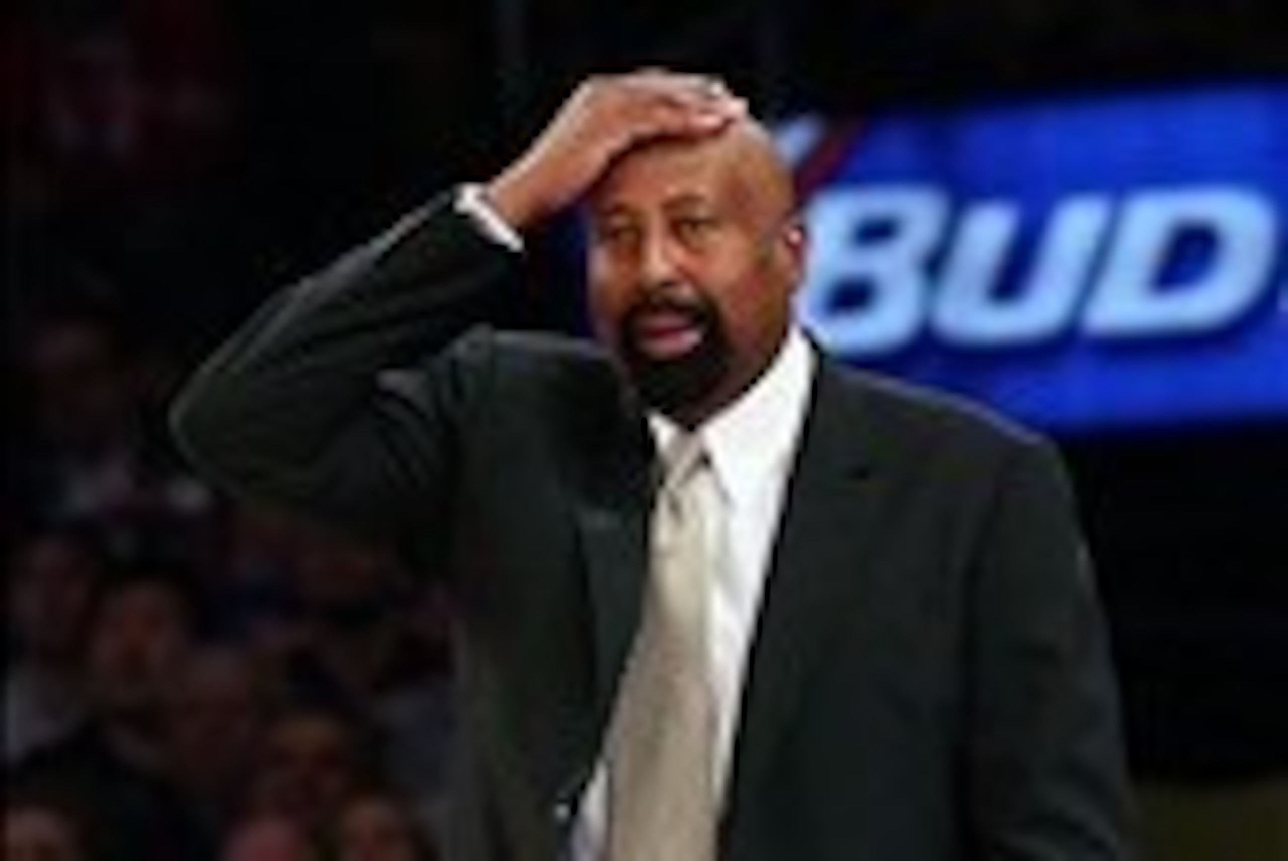 Mar 10, 2014; New York, NY, USA;  New York Knicks head coach Mike Woodson reacts to an officials call during the third quarter against the Philadelphia 76ers at Madison Square Garden. New York Knicks won 123-110.  Mandatory Credit: Anthony Gruppuso-USA TO