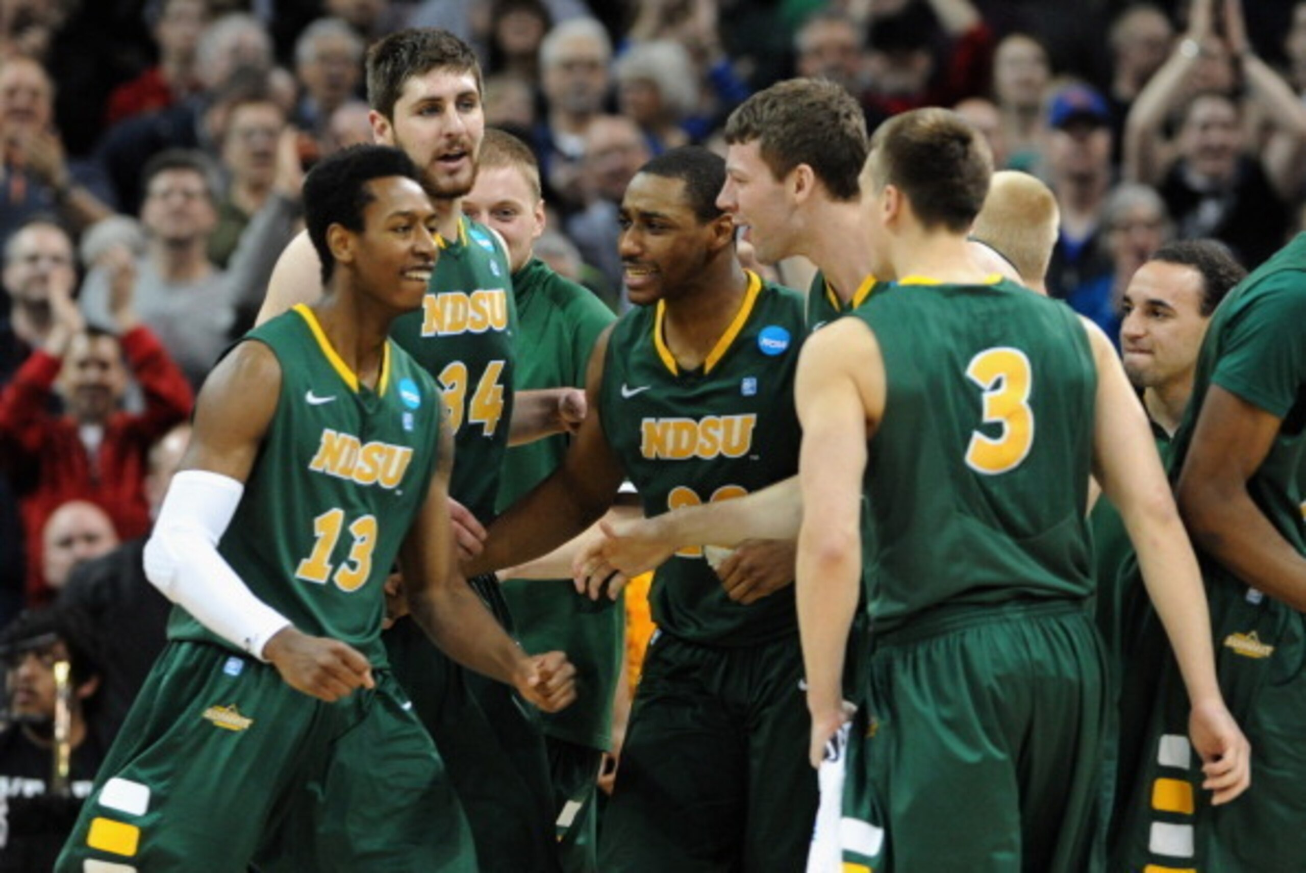 SPOKANE, WA - MARCH 20:  Carlin Dupree #13 of the North Dakota State Bison celebrates with his teammates against the Oklahoma Sooners during the second round of the 2014 NCAA Men's Basketball Tournament at Spokane Veterans Memorial Arena on March 20, 2014
