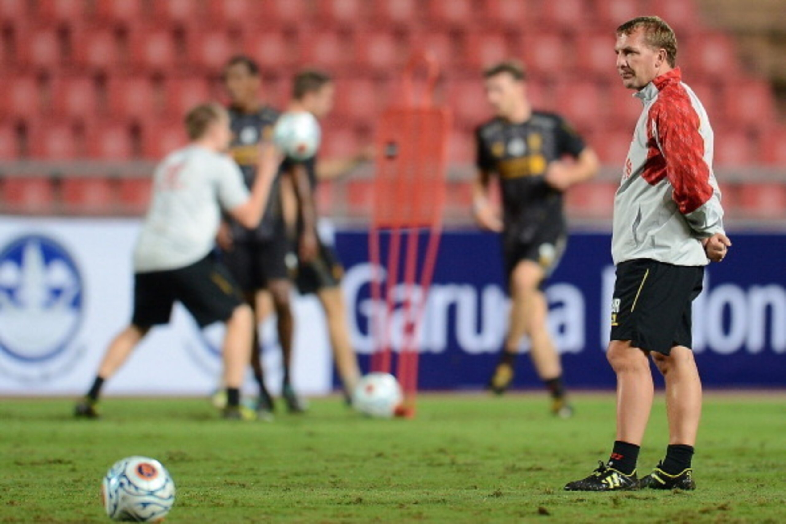 BANGKOK, THAILAND - JULY 27:  Manager Brendan Rodgers oversees a Liverpool FC training session at Rajamangala Stadium on July 27, 2013 in Bangkok, Thailand.  (Photo by Thananuwat Srirasant/Getty Images)