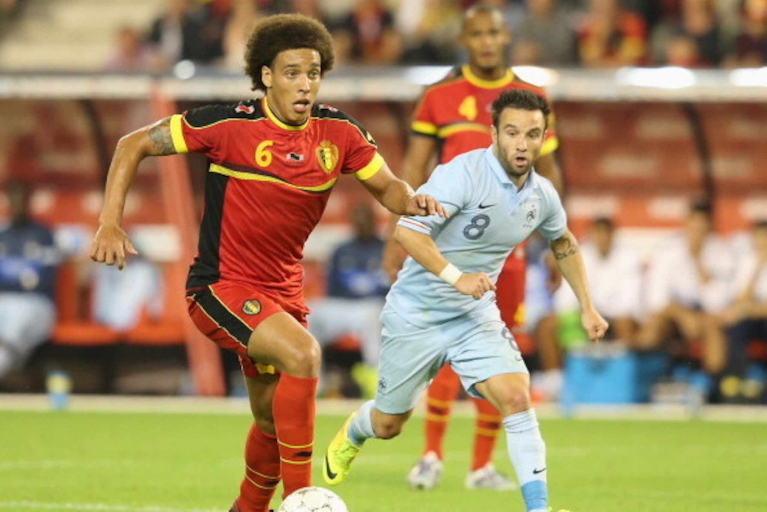 BRUSSELS, BELGIUM - AUGUST 14:  Axel Witsel of Belgium runs with the ball during the International friendly match between Belgium and France at the King Baudouin Stadium on August 14, 2013 in Brussels, Belgium.  (Photo by David Rogers/Getty Images)