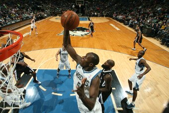 MINNEAPOLIS, MN - MARCH 16: Gorgui Dieng #5 of the Minnesota Timberwolves shoots against the Sacramento Kings  on March 16, 2014 at Target Center in Minneapolis, Minnesota. NOTE TO USER: User expressly acknowledges and agrees that, by downloading and or u