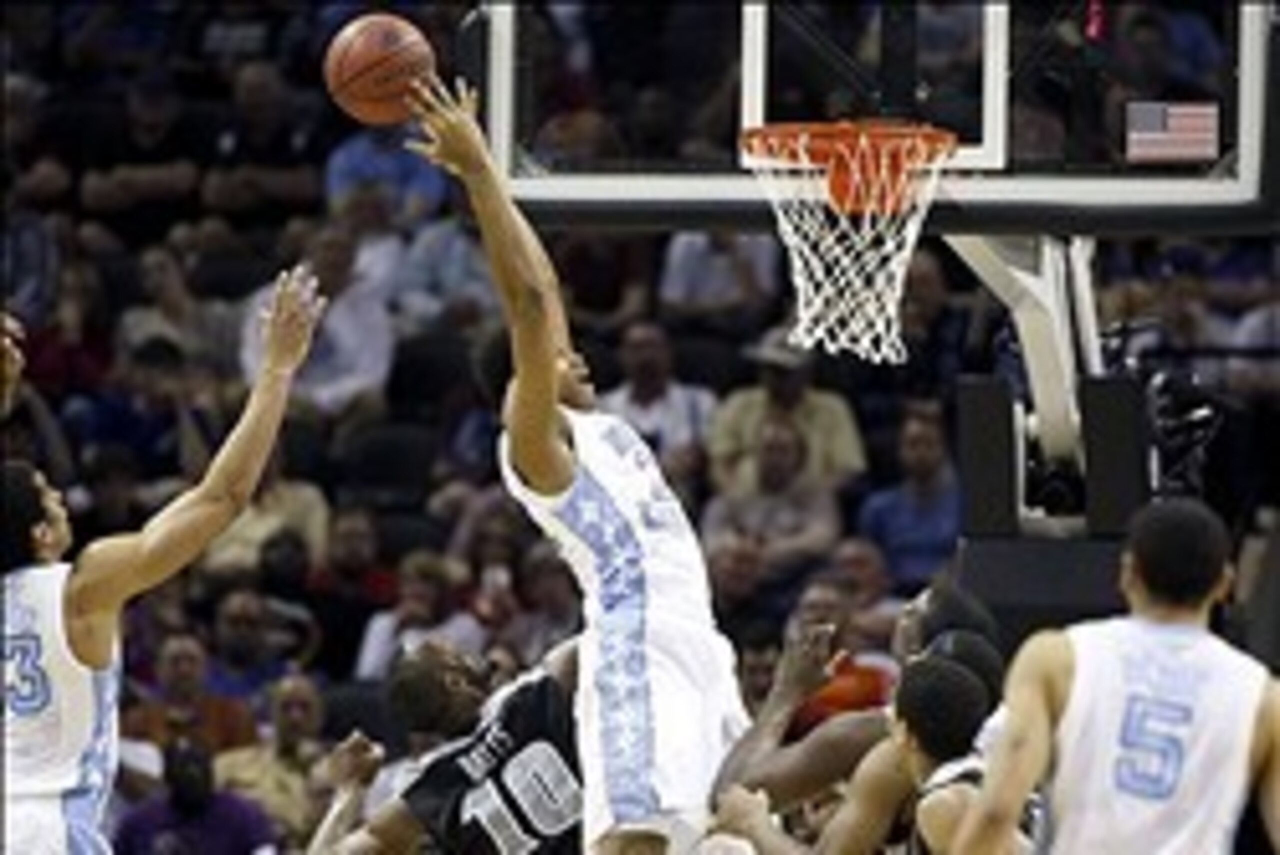 Mar 21, 2014; San Antonio, TX, USA; North Carolina Tar Heels forward Isaiah Hicks (22) shoots over Providence Friars forward Kadeem Batts (10) in the first half of a men's college basketball game during the second round of the 2014 NCAA Tournament at AT&T