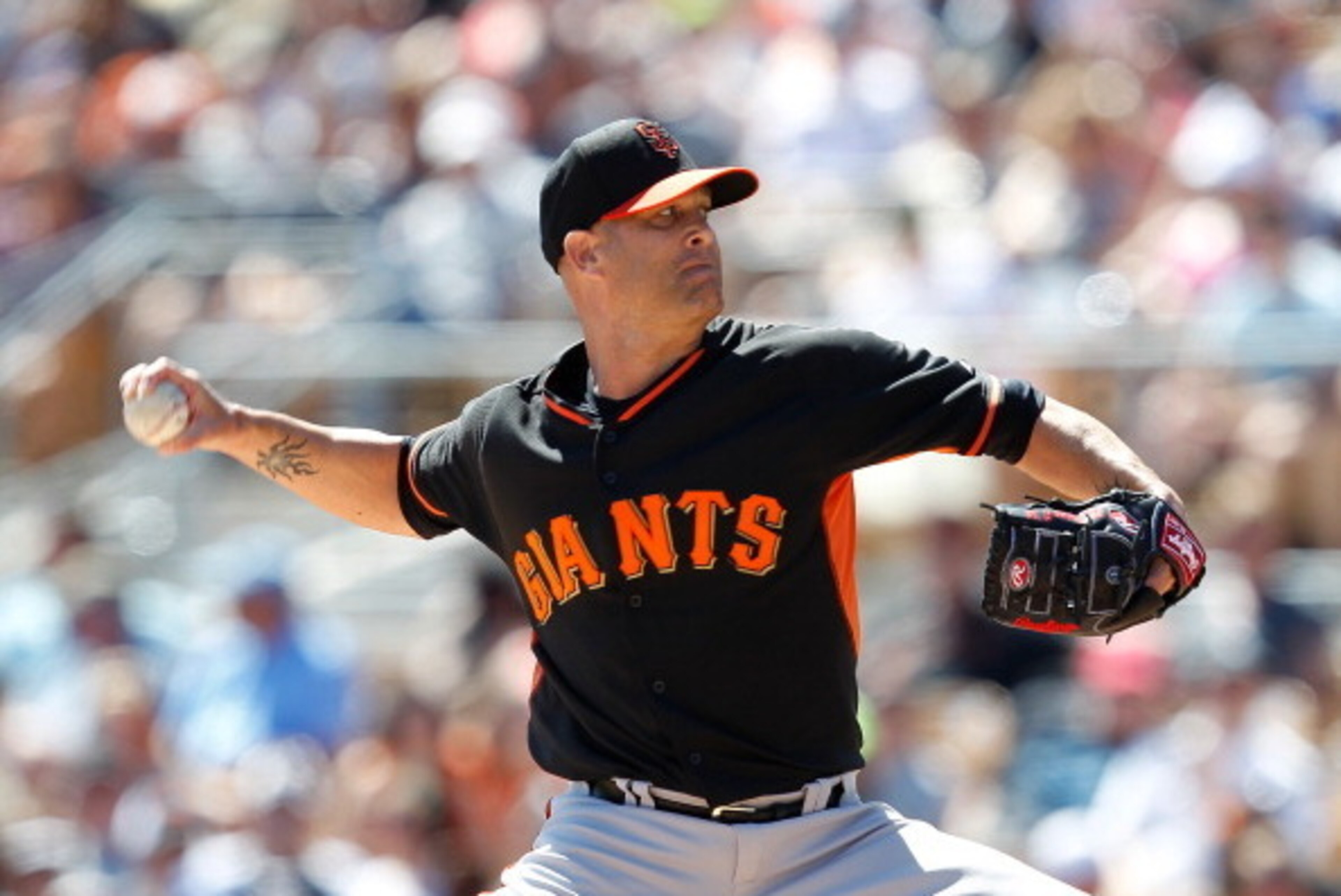GLENDALE, AZ - MARCH 22: Tim Hudson #17 of the San Francisco Giants pitches during a game against the Chicago White Sox at Camelback Ranch on March 22, 2014 in Glendale, Arizona.  (Photo by Sarah Glenn/Getty Images)