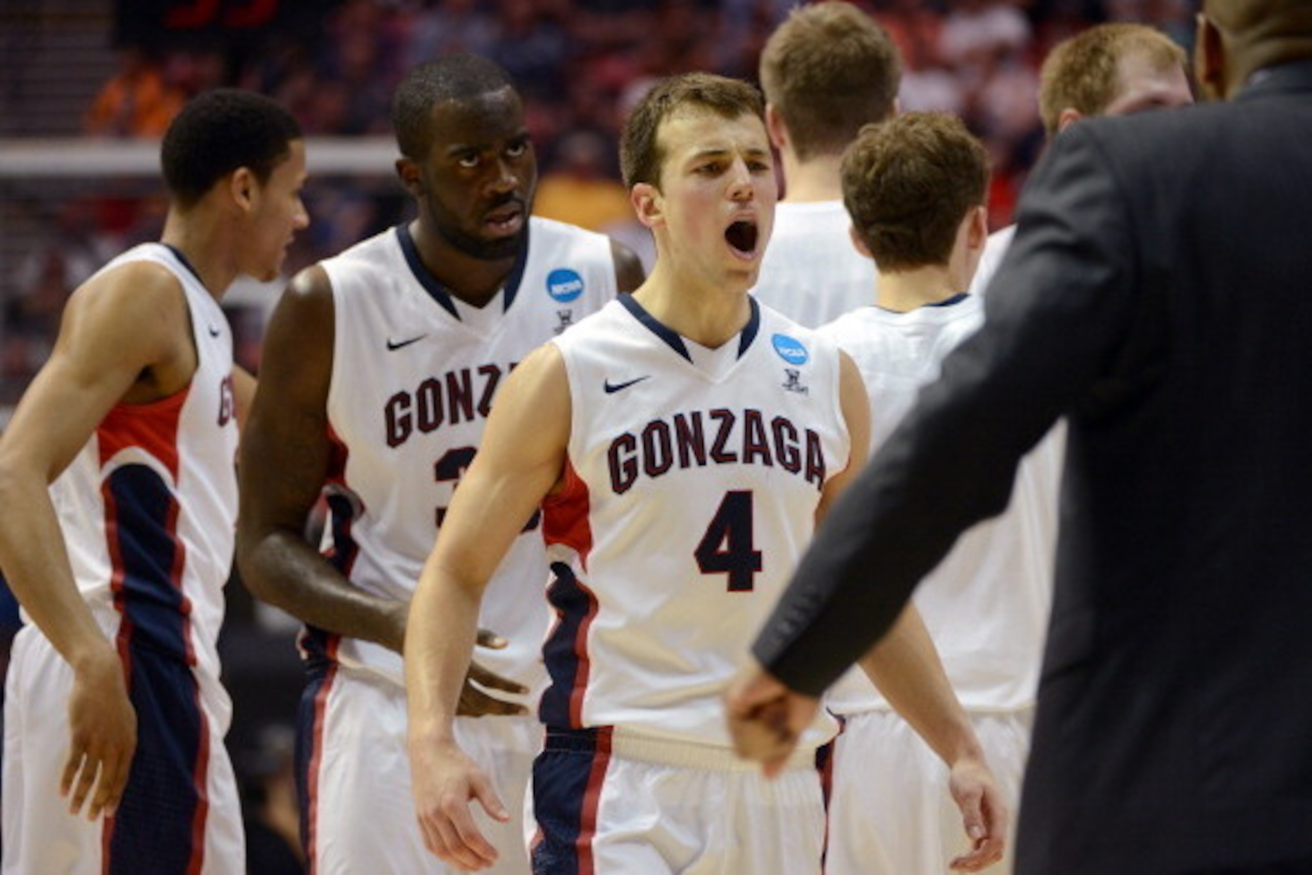 SAN DIEGO, CA - MARCH 21:  Kevin Pangos #4 of the Gonzaga Bulldogs reacts as he heads to the bench for a time out during their game against the Oklahoma State Cowboys in the second round of the 2014 NCAA Men's Basketball Tournament at Viejas Arena on Marc