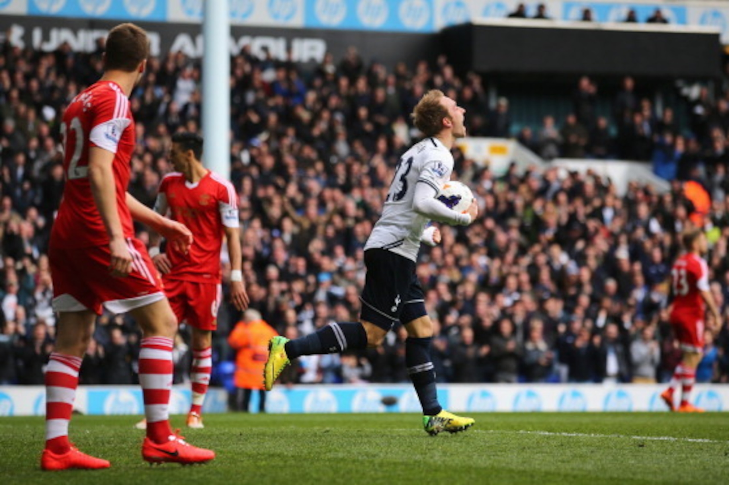 LONDON, ENGLAND - MARCH 23: Christian Eriksen of Tottenham Hotspur celebrates scoring his second goal during the Barclays Premier League match between Tottenham Hotspur and Southampton at White Hart Lane on March 23, 2014 in London, England.  (Photo by Cl