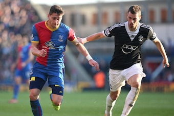 LONDON, ENGLAND - MARCH 08:  Joel Ward of Palace gets away from Morgan Schneiderlin of Southampton during the Barclays Premier League match between Crystal Palace and Southampton at Selhurst Park on March 08, 2014 in London, England. (Photo by Charlie Cro