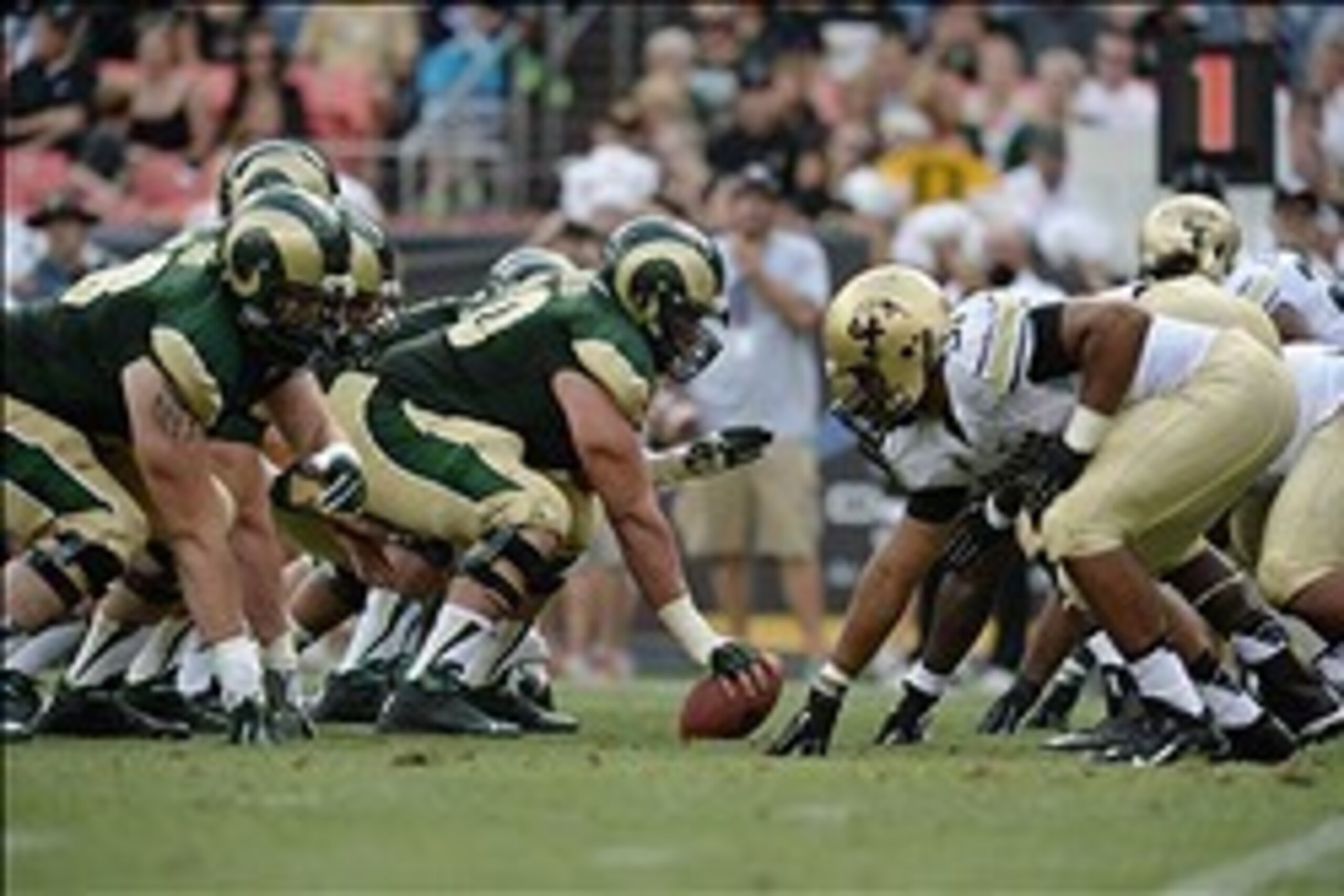 Sep 1, 2013; Denver, CO, USA; Colorado State Rams offensive linesman Weston Richburg (70) prepares to hike the football against the Colorado Buffaloesin the second quarter at Sports Authority Field at Mile High. Mandatory Credit: Ron Chenoy-USA TODAY Spor