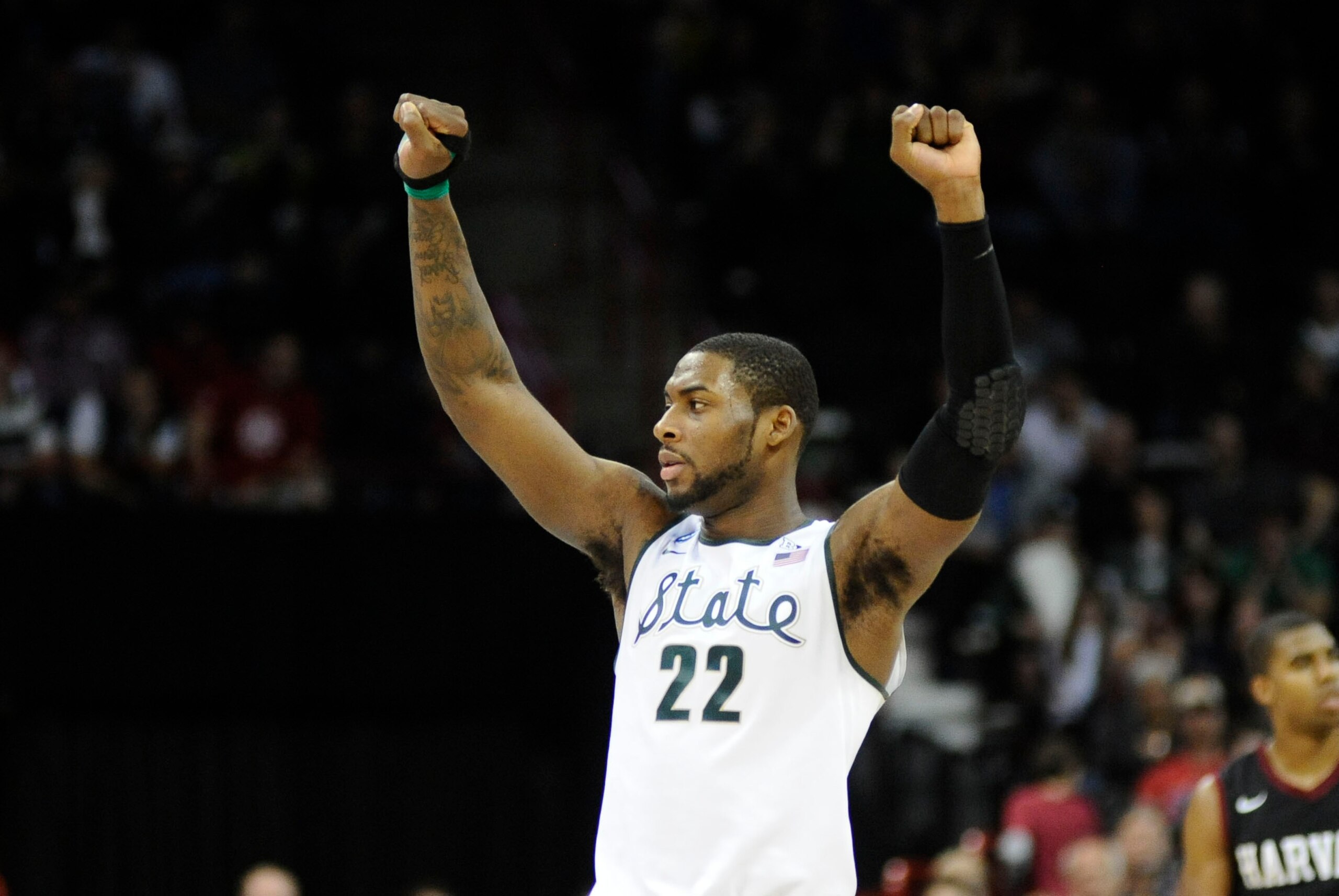 Mar 22, 2014; Spokane, WA, USA; Michigan State Spartans guard/forward Branden Dawson (22) celebrates against the Harvard Crimson in the second half of a men's college basketball game during the third round of the 2014 NCAA Tournament at Veterans Memorial