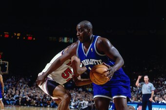 NEW YORK - APRIL 24:  Anthony Mason #14 of the Charlotte Hornets drives to the basket against Buck Williams #52 of the New York Knicks in Game One of the Eastern Conference Quarterfinals during the 1997 NBA Playoffs at Madison Square Garden on April 24, 1