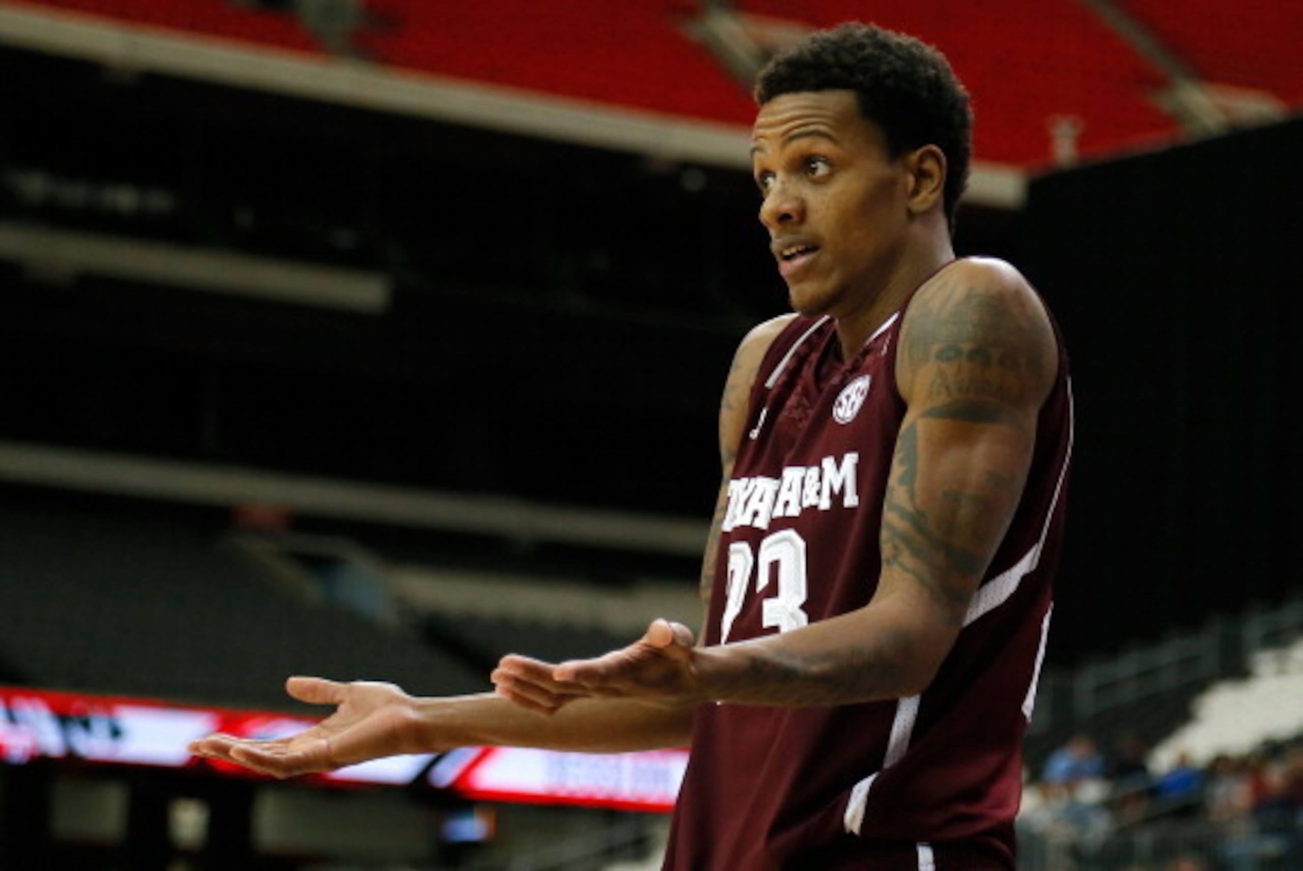 ATLANTA, GA - MARCH 13:  Jamal Jones #23 of the Texas A&M Aggies reacts against Missouri Tigers during the second round of the SEC Men's Basketball Tournament at Georgia Dome on March 13, 2014 in Atlanta, Georgia.  (Photo by Kevin C. Cox/Getty Images)