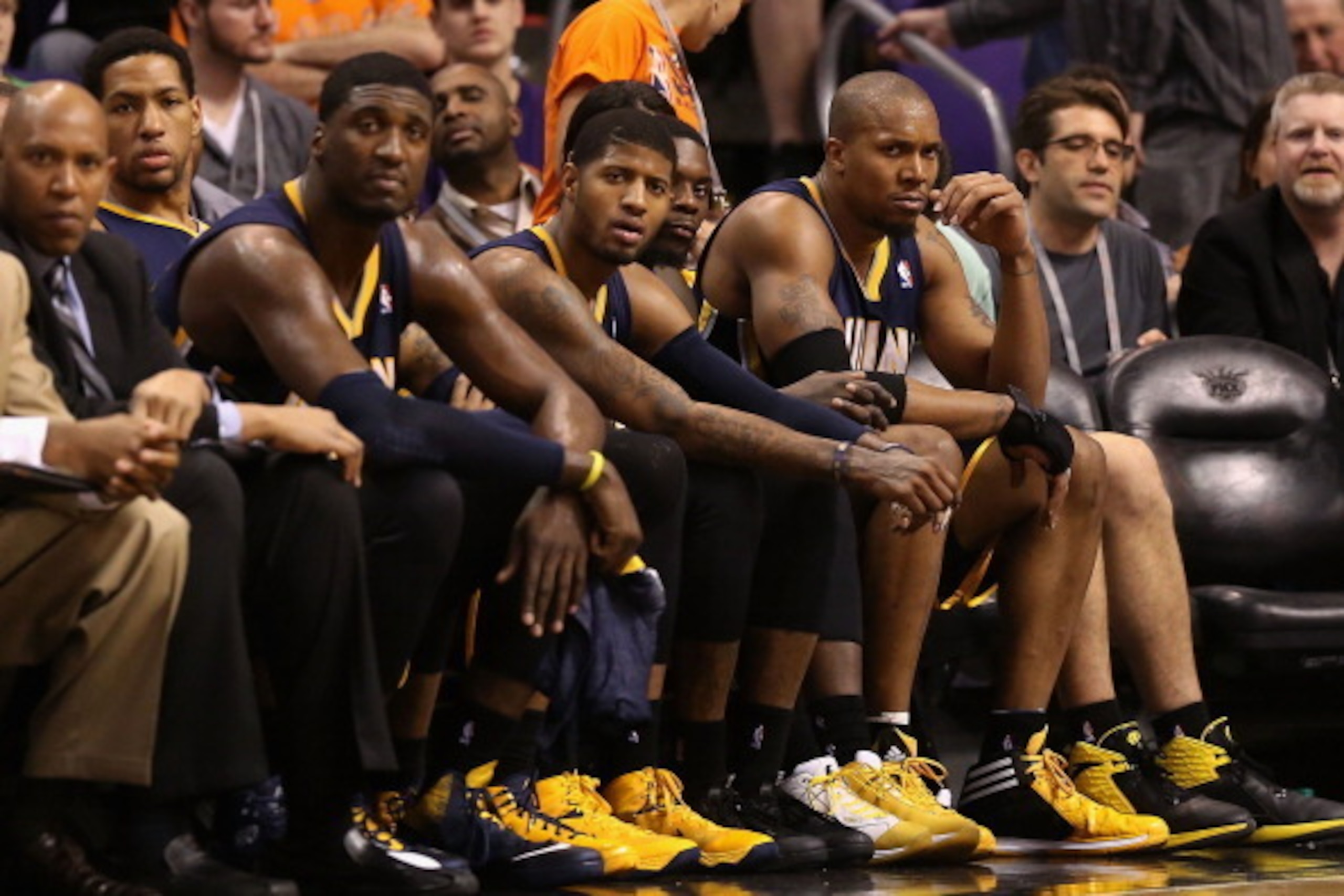 PHOENIX, AZ - JANUARY 22:  (R-L) David West #21, Lance Stephenson #1, Paul George #24 and Roy Hibbert #55 of the Indiana Pacers react on the bench during the second half of the NBA game against the Phoenix Suns at US Airways Center on January 22, 2014 in 