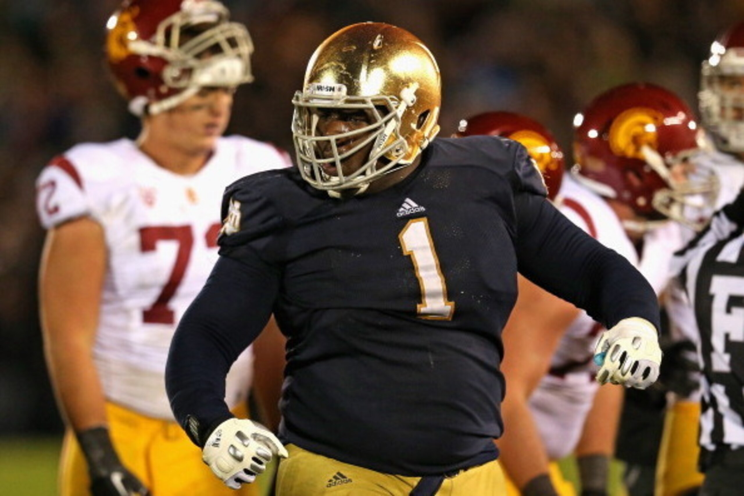 SOUTH BEND, IN - OCTOBER 19: Louis Nix III #1 of the Notre Dame Fighting Irish celebrates near the end of the game against the University of Southern California Trojans at Notre Dame Stadium on October 19, 2013 in South Bend, Indiana. Notre Dame defeated SOUTH BEND, IN - OCTOBER 19: Louis Nix III #1 of the Notre Dame Fighting Irish celebrates near the end of the game against the University of Southern California Trojans at Notre Dame Stadium on October 19, 2013 in South Bend, Indiana. Notre Dame defeated