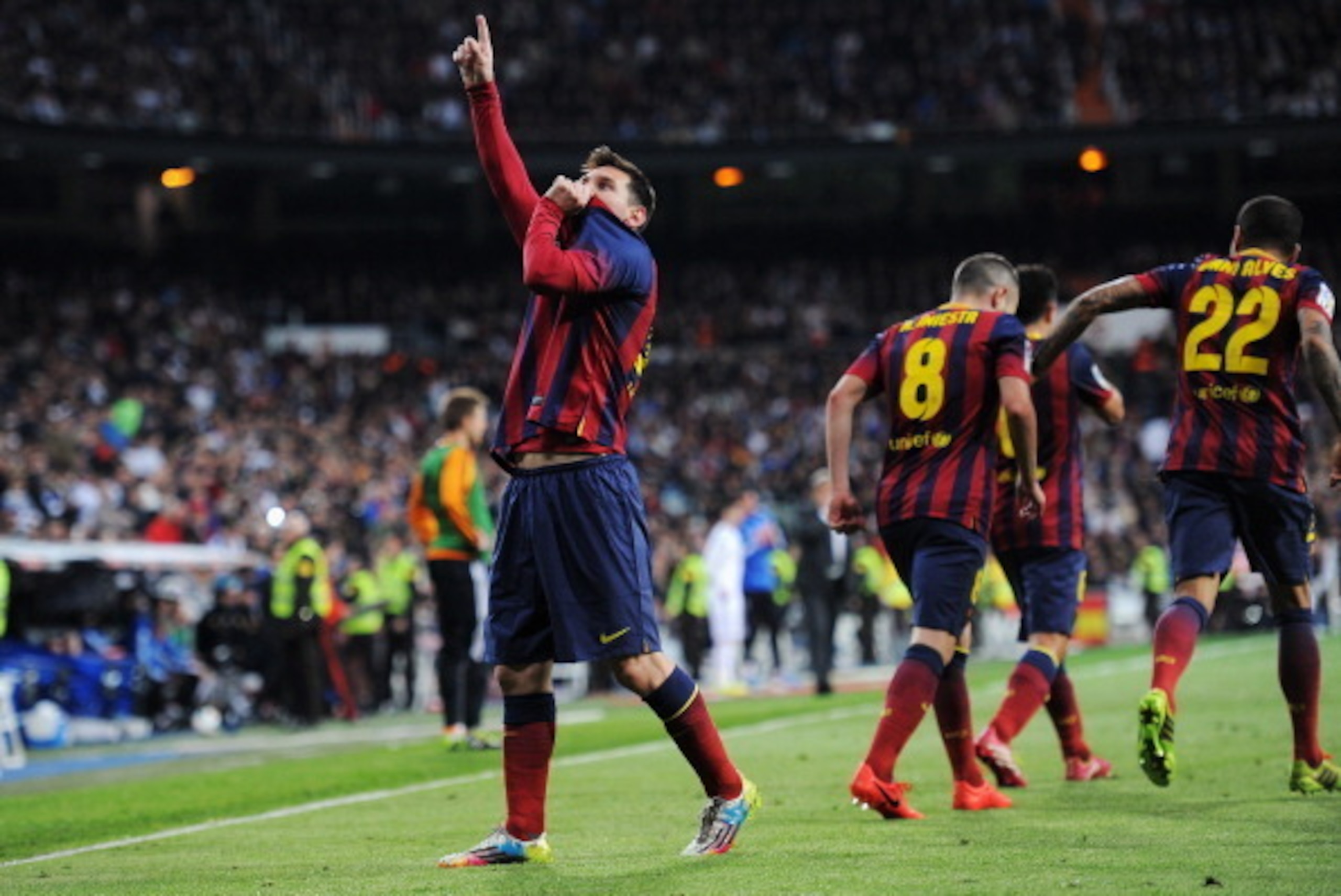 MADRID, SPAIN - MARCH 23:  Lionel Messi of Barcelona celebrates scoring his team's fourth goal during the La Liga match between Real Madrid CF and FC Barcelona at the Bernabeu on March 23, 2014 in Madrid, Spain.  (Photo by Denis Doyle/Getty Images)