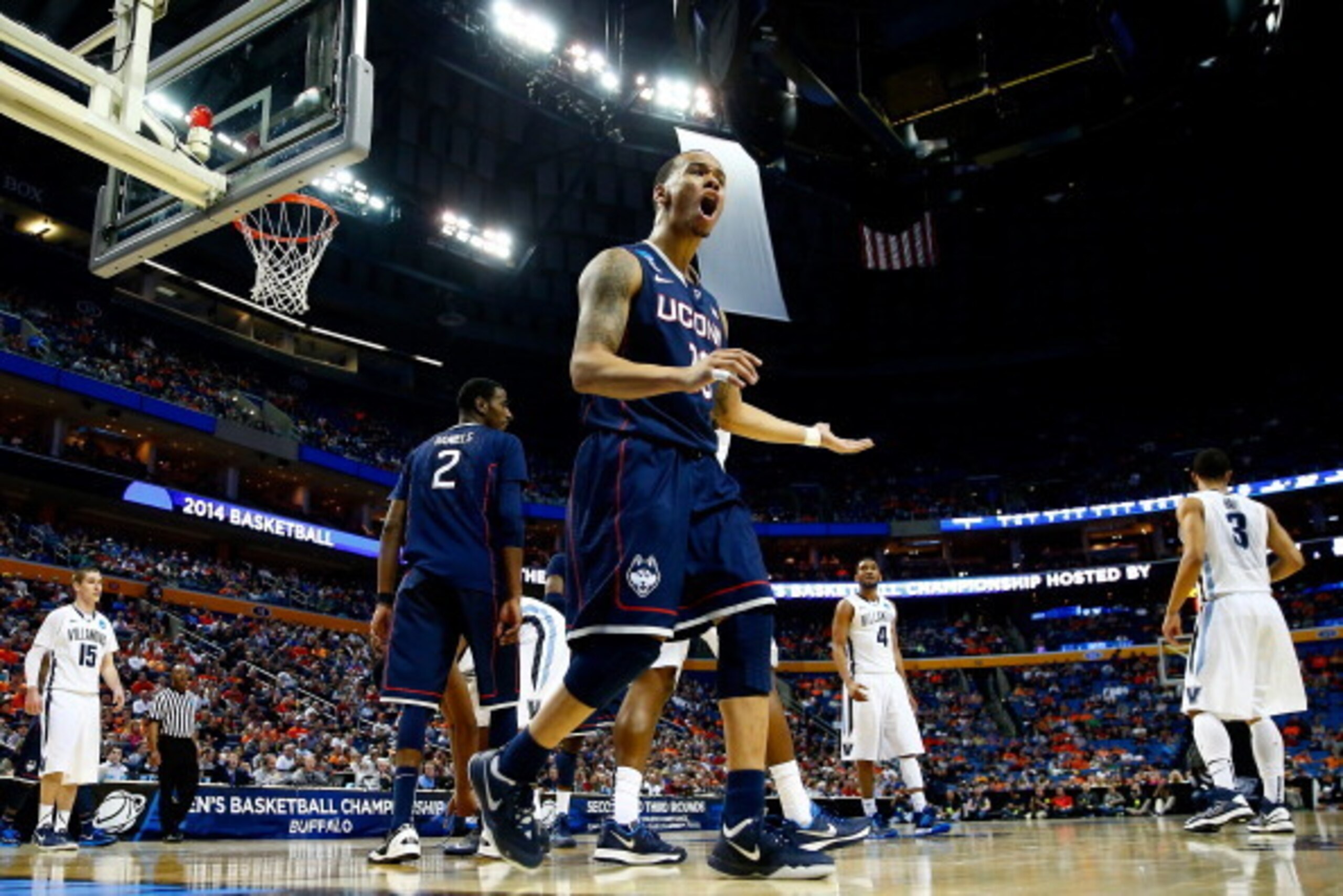 BUFFALO, NY - MARCH 22:  Shabazz Napier #13 of the Connecticut Huskies reacts against the Villanova Wildcats during the third round of the 2014 NCAA Men's Basketball Tournament at the First Niagara Center on March 22, 2014 in Buffalo, New York.  (Photo by