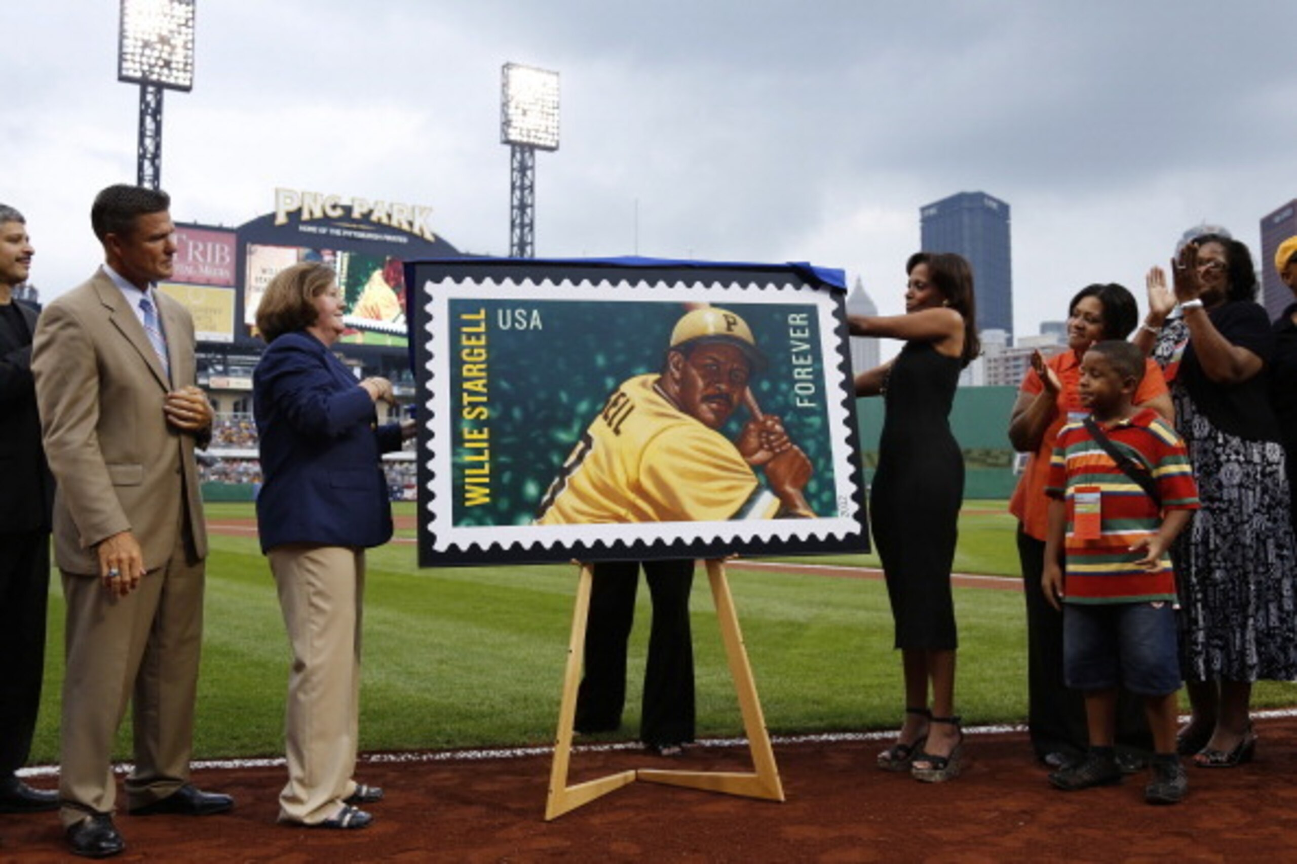 PITTSBURGH, PA - JULY 21: Members of the Pittsburgh Pirates organization and family members of former player Willie Stargell unveil a commemorative stamp issued by the United States Postal Service prior to the game against the Miami Marlins at PNC Park on PITTSBURGH, PA - JULY 21: Members of the Pittsburgh Pirates organization and family members of former player Willie Stargell unveil a commemorative stamp issued by the United States Postal Service prior to the game against the Miami Marlins at PNC Park on