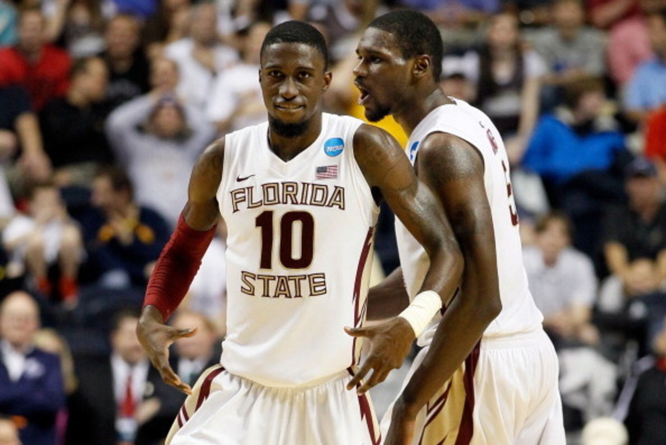 NASHVILLE, TN - MARCH 16:  Okaro White #10 of the Florida State Seminoles celebrates with teammate Bernard James #5 after a play against the St. Bonaventure Bonnies during the second round of the 2012 NCAA Men's Basketball Tournament at Bridgestone Arena 