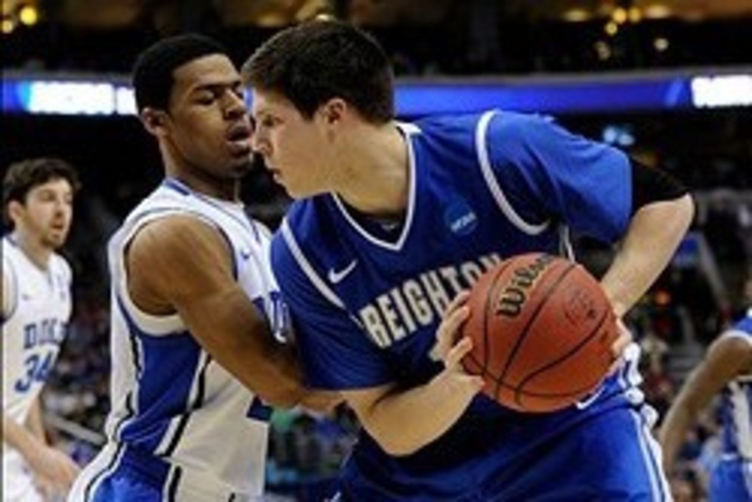 Mar 24, 2013; Philadelphia, PA, USA; Creighton forward Doug McDermott (3) is defended by Duke guard Quinn Cook (2) in the first half during the third round of the NCAA basketball tournament at Wells Fargo Center. Mandatory Credit: Eileen Blass-USA TODAY S