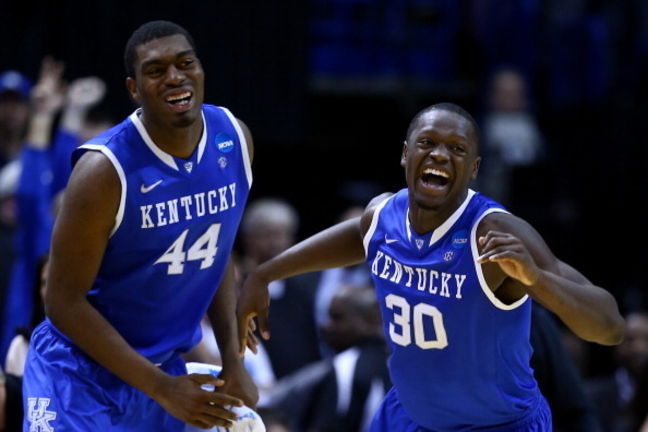 ST LOUIS, MO - MARCH 23:  Julius Randle #30 of the Kentucky Wildcats celebrates with teammate Dakari Johnson #44 after defeating the Wichita State Shockers 78 to 76 during the third round of the 2014 NCAA Men's Basketball Tournament at Scottrade Center on