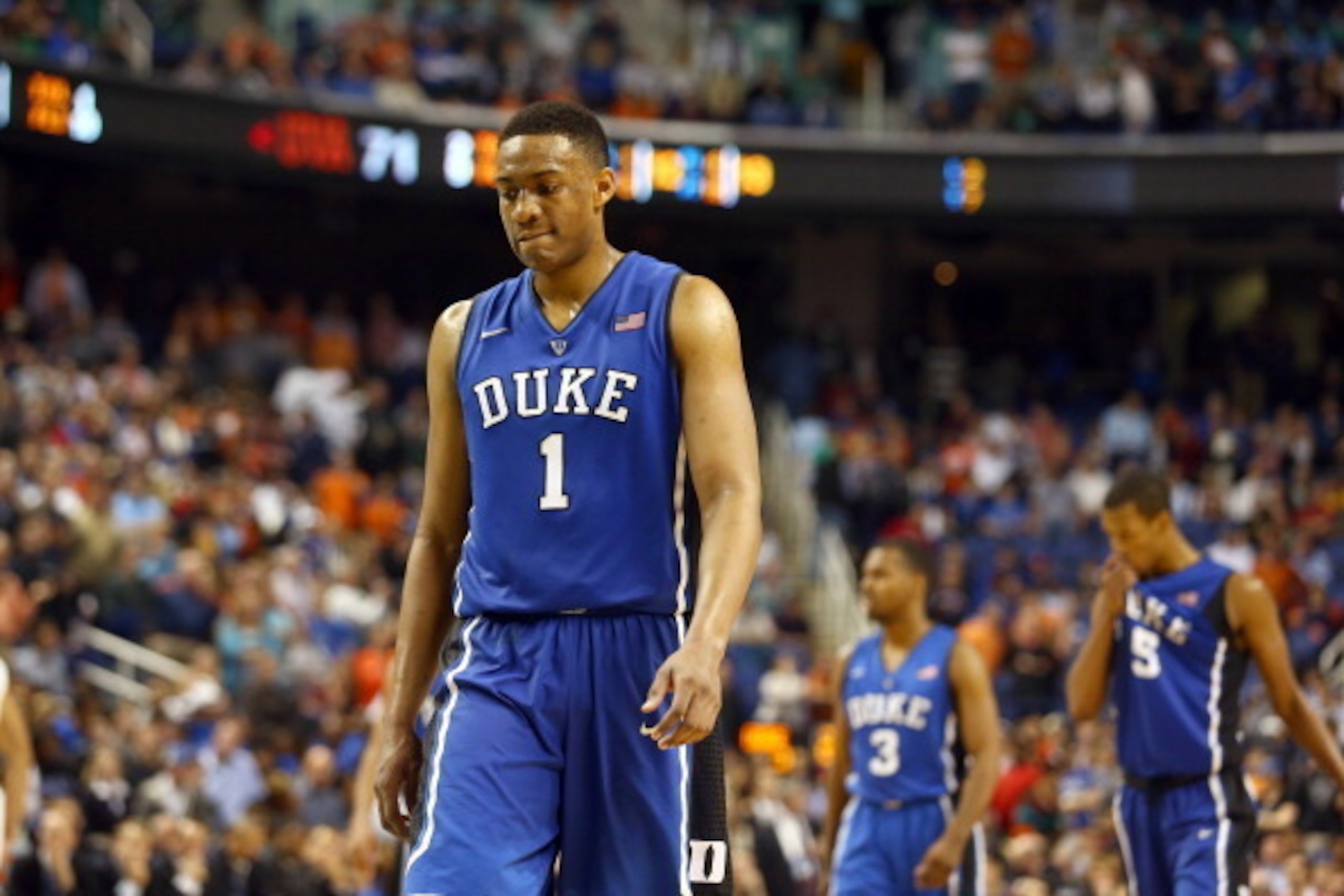 GREENSBORO, NC - MARCH 16:  Jabari Parker #1 of the Duke Blue Devils reacts during their final minutes of their loss to the Virginia Cavaliers in the finals of the 2014 Men's ACC Basketball Tournament at Greensboro Coliseum on March 16, 2014 in Greensboro