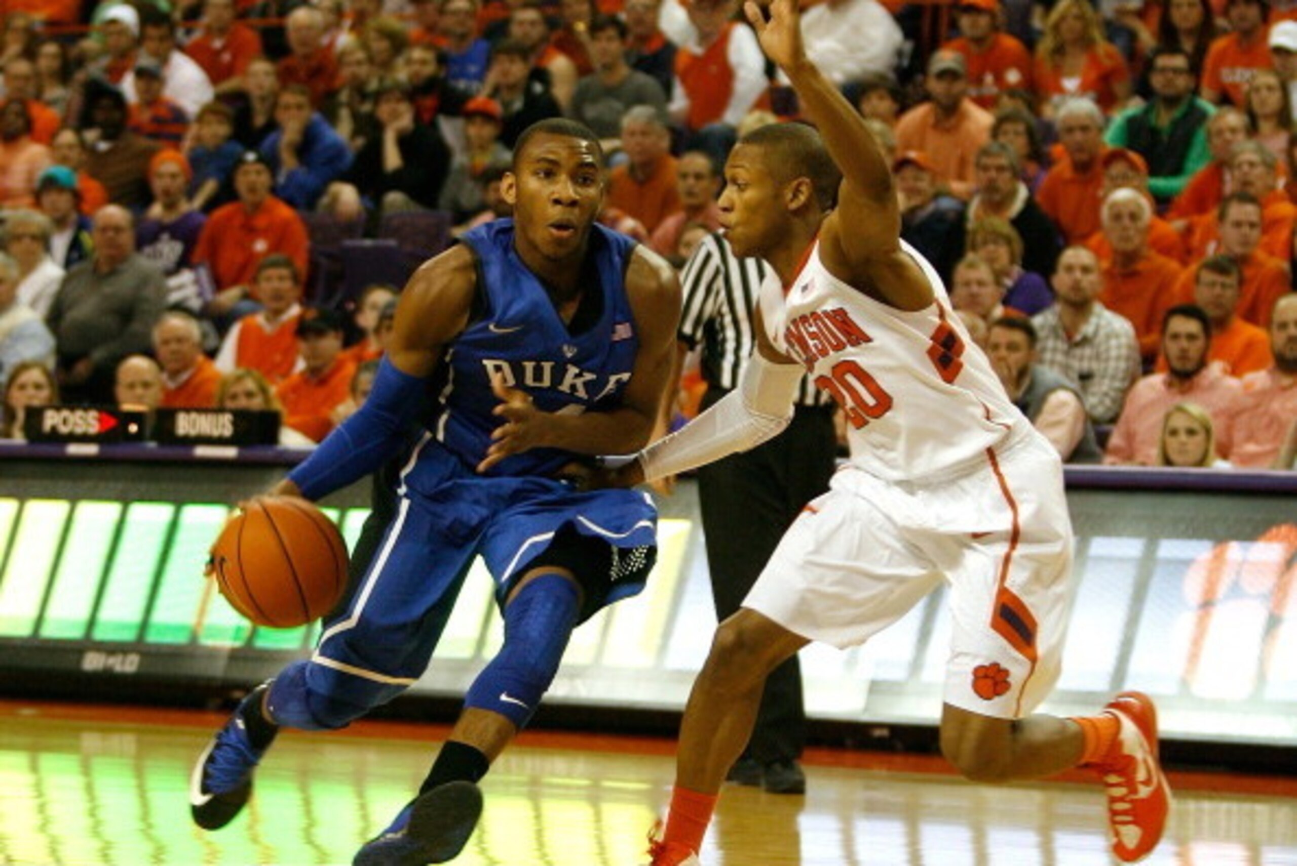 CLEMSON, SC - JANUARY 11: Andre Dawkins #34 of the Duke Blue Devils drives to the basket past Jordan Roper #20 of the Clemson Tigers during the game at Littlejohn Coliseum on January 11, 2014 in Clemson, South Carolina. (Photo by Tyler Smith/Getty Images)