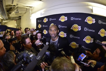 NEW YORK, NY - JANUARY 26: Kobe Bryant #24 of the Los Angeles Lakers speaks with the media after to the game against the New York Knicks at Madison Square Garden on January 26, 2014 in New York, New York. NOTE TO USER: User expressly acknowledges and agre