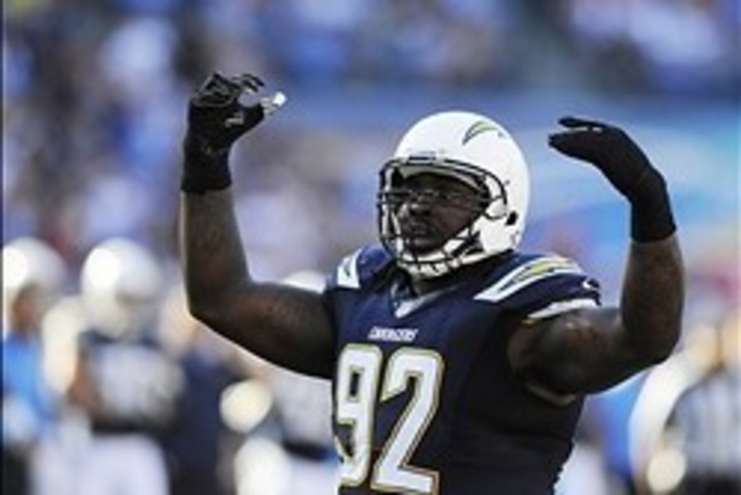 Dec 29, 2013; San Diego, CA, USA; San Diego Chargers defensive tackle Cam Thomas (92) reacts after a stop during the first half against the Kansas City Chiefs at Qualcomm Stadium. Mandatory Credit: Christopher Hanewinckel-USA TODAY Sports