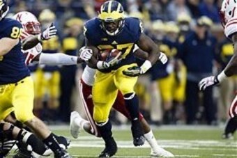 Nov 9, 2013; Ann Arbor, MI, USA; Michigan Wolverines running back Derrick Green (27) runs the ball against the Nebraska Cornhuskers in the second quarter at Michigan Stadium. Mandatory Credit: Rick Osentoski-USA TODAY Sports