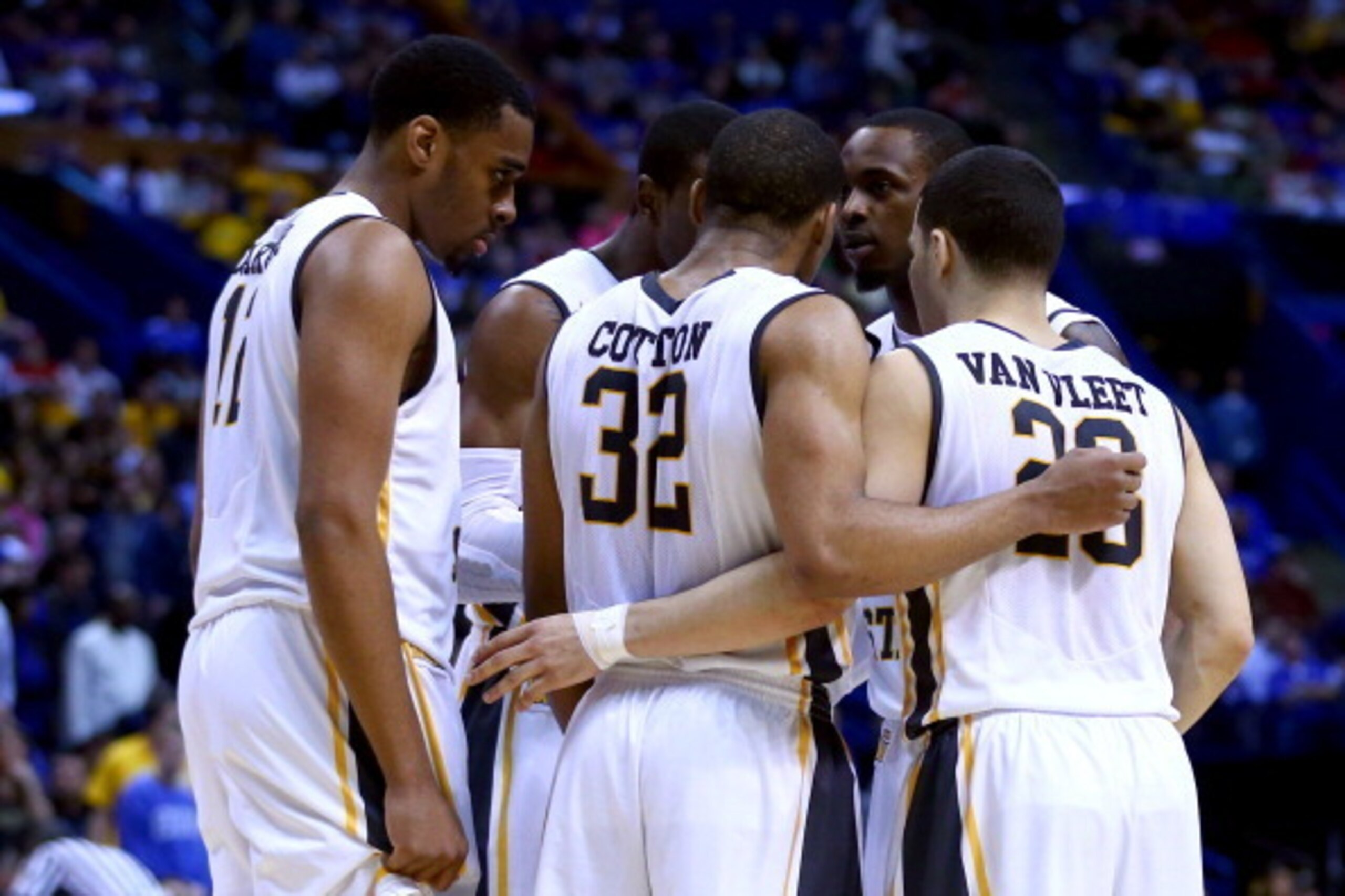 ST LOUIS, MO - MARCH 23:  The Wichita State Shockers huddle during a break in play against the Kentucky Wildcats the third round of the 2014 NCAA Men's Basketball Tournament at Scottrade Center on March 23, 2014 in St Louis, Missouri.  (Photo by Dilip Vis