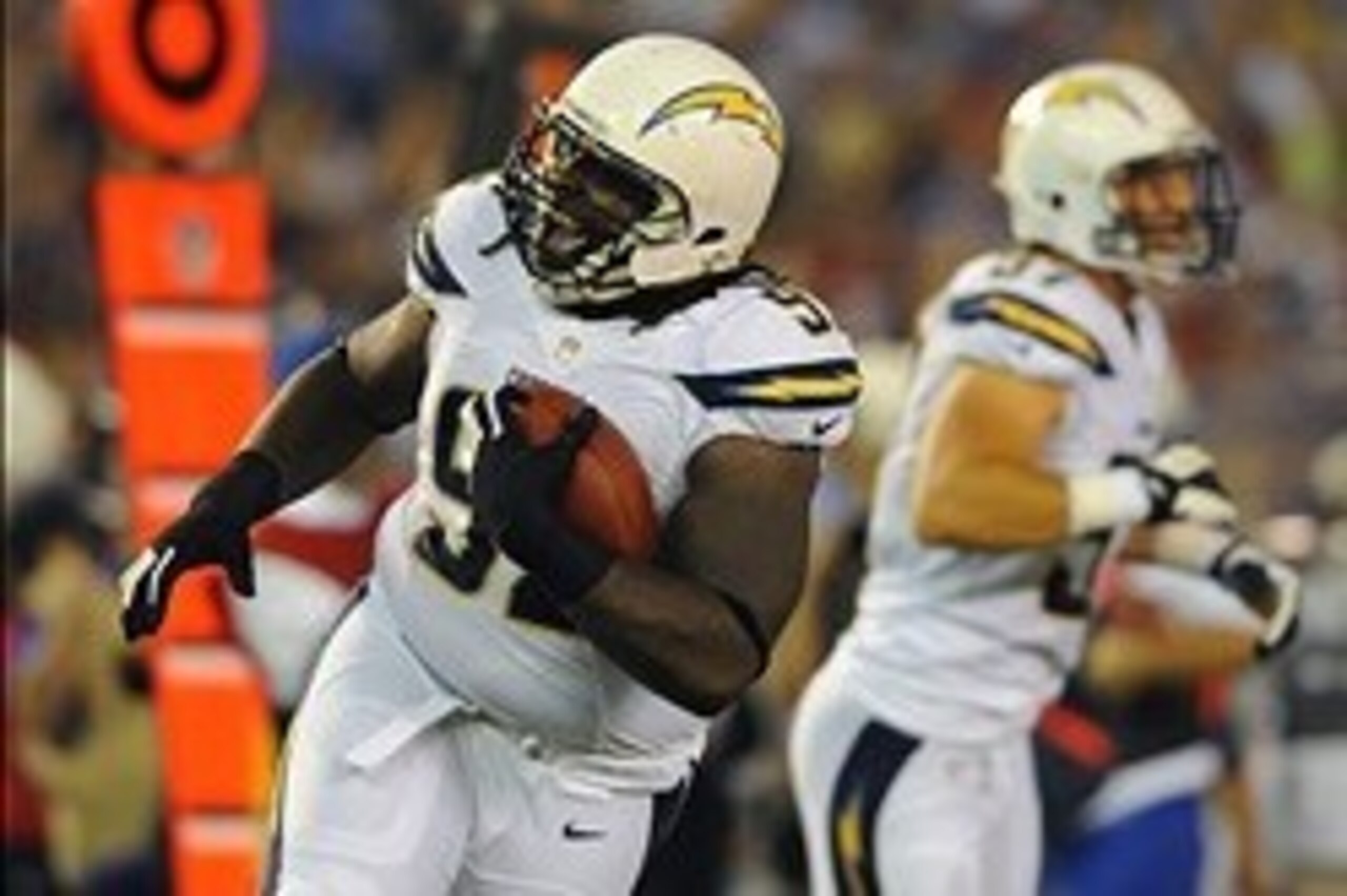 Sep 9, 2013; San Diego, CA, USA; San Diego Chargers defensive tackle Cam Thomas (92) celebrates after an interception on the first play of the game during the first half against the Houston Texans at Qualcomm Stadium. Mandatory Credit: Christopher Hanewin