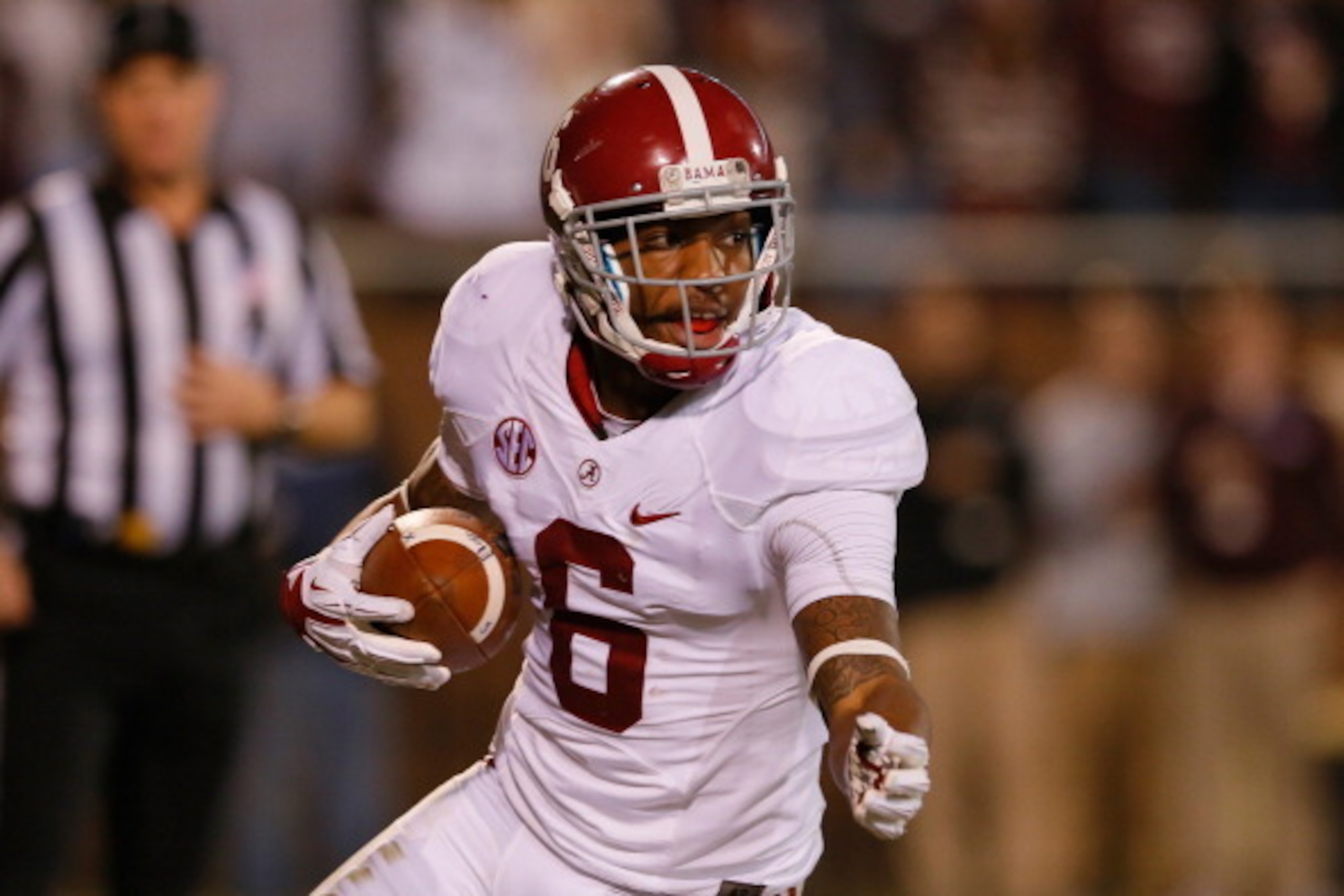 STARKVILLE, MS - NOVEMBER 16:  Ha Ha Clinton-Dix #6 of the Alabama Crimson Tide intercepts a touchdown reception intended for Jameon Lewis #4 of the Mississippi State Bulldogs at Davis Wade Stadium on November 16, 2013 in Starkville, Mississippi.  (Photo 