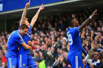 LONDON, ENGLAND - MARCH 22:  Andre Schurrle of Chelsea celebrates scoring his second goal with Nemanja Matic and Samuel Eto'o of Chelsea during the Barclays Premier League match between Chelsea and Arsenal at Stamford Bridge on March 22, 2014 in London, E