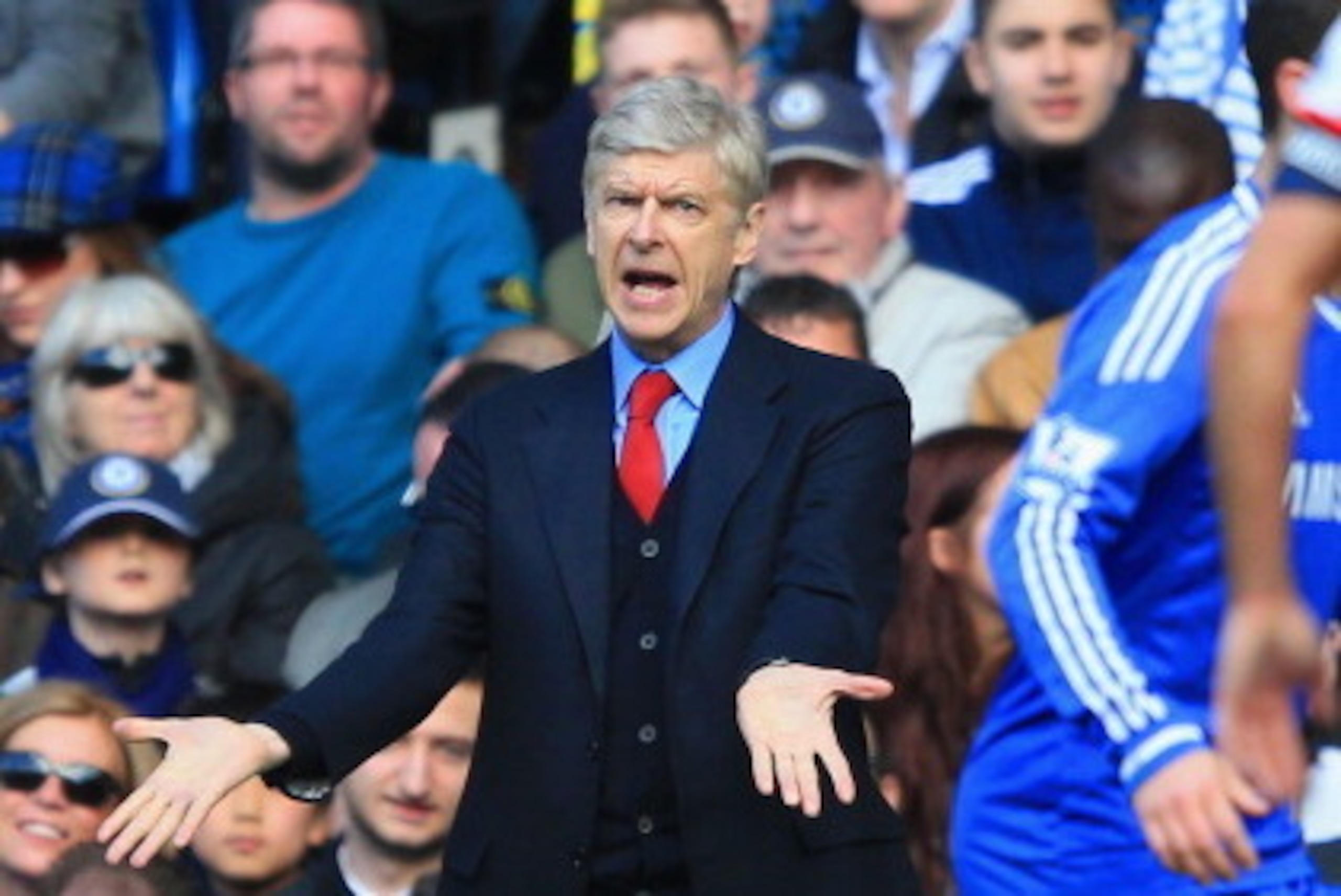 LONDON, ENGLAND - MARCH 22:  Arsene Wenger manager of Arsenal  appeals  during the Barclays Premier League match between Chelsea and Arsenal at Stamford Bridge on March 22, 2014 in London, England.  (Photo by Richard Heathcote/Getty Images)
