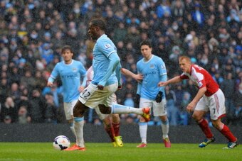 MANCHESTER, ENGLAND - MARCH 22: Yaya Toure of Manchester City scores their second goal from the penalty spot during the Barclays Premier League match between Manchester City and Fulham at Etihad Stadium on March 22, 2014 in Manchester, England. (Photo b MANCHESTER, ENGLAND - MARCH 22: Yaya Toure of Manchester City scores their second goal from the penalty spot during the Barclays Premier League match between Manchester City and Fulham at Etihad Stadium on March 22, 2014 in Manchester, England. (Photo b