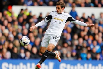 LIVERPOOL, ENGLAND - MARCH 22:  Angel Rangel of Swansea City in action during the Barclays Premier League match between Everton and Swansea City at Goodison Park on March 22, 2014 in Liverpool, England.  (Photo by Paul Thomas/Getty Images)