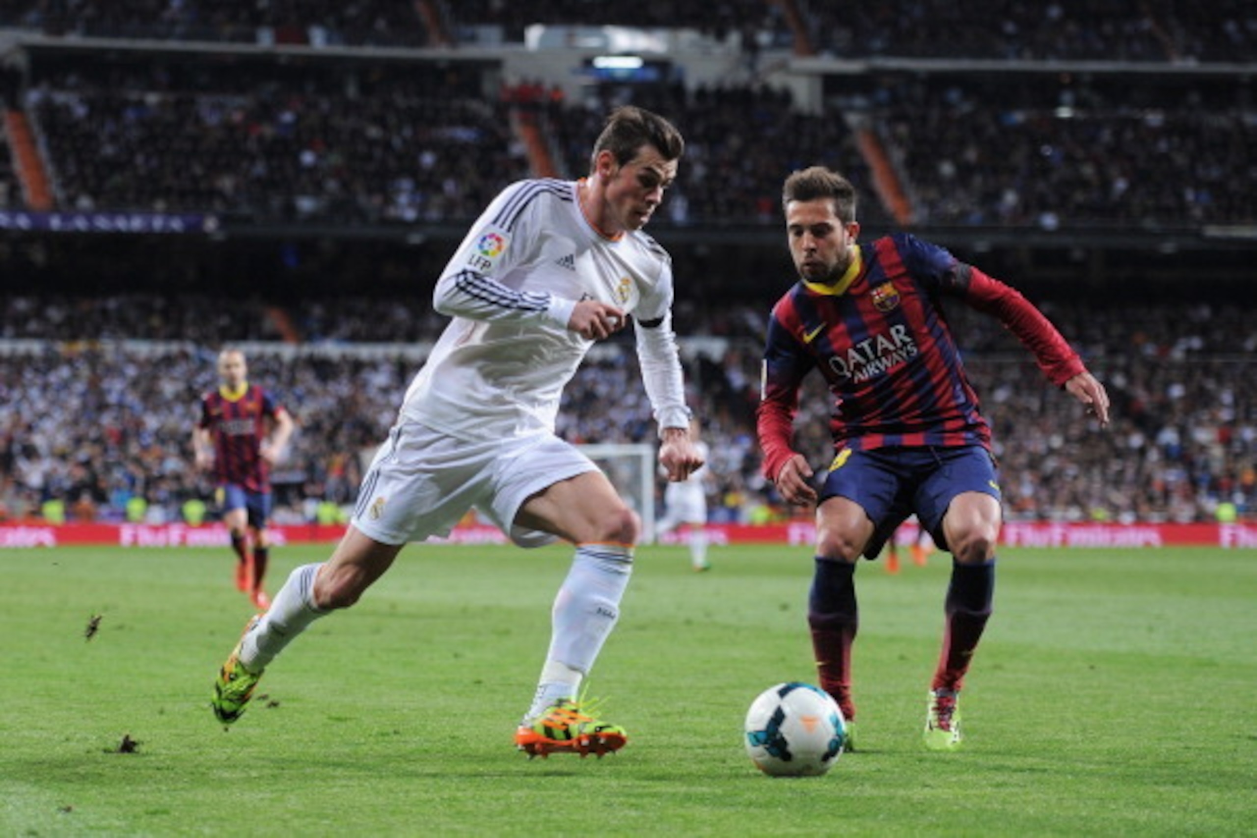 MADRID, SPAIN - MARCH 23:  Gareth Bale of Real Madrid takes on Jordi Alba of Barcelona during the La Liga match between Real Madrid CF and FC Barcelona at the Bernabeu on March 23, 2014 in Madrid, Spain.  (Photo by Denis Doyle/Getty Images)